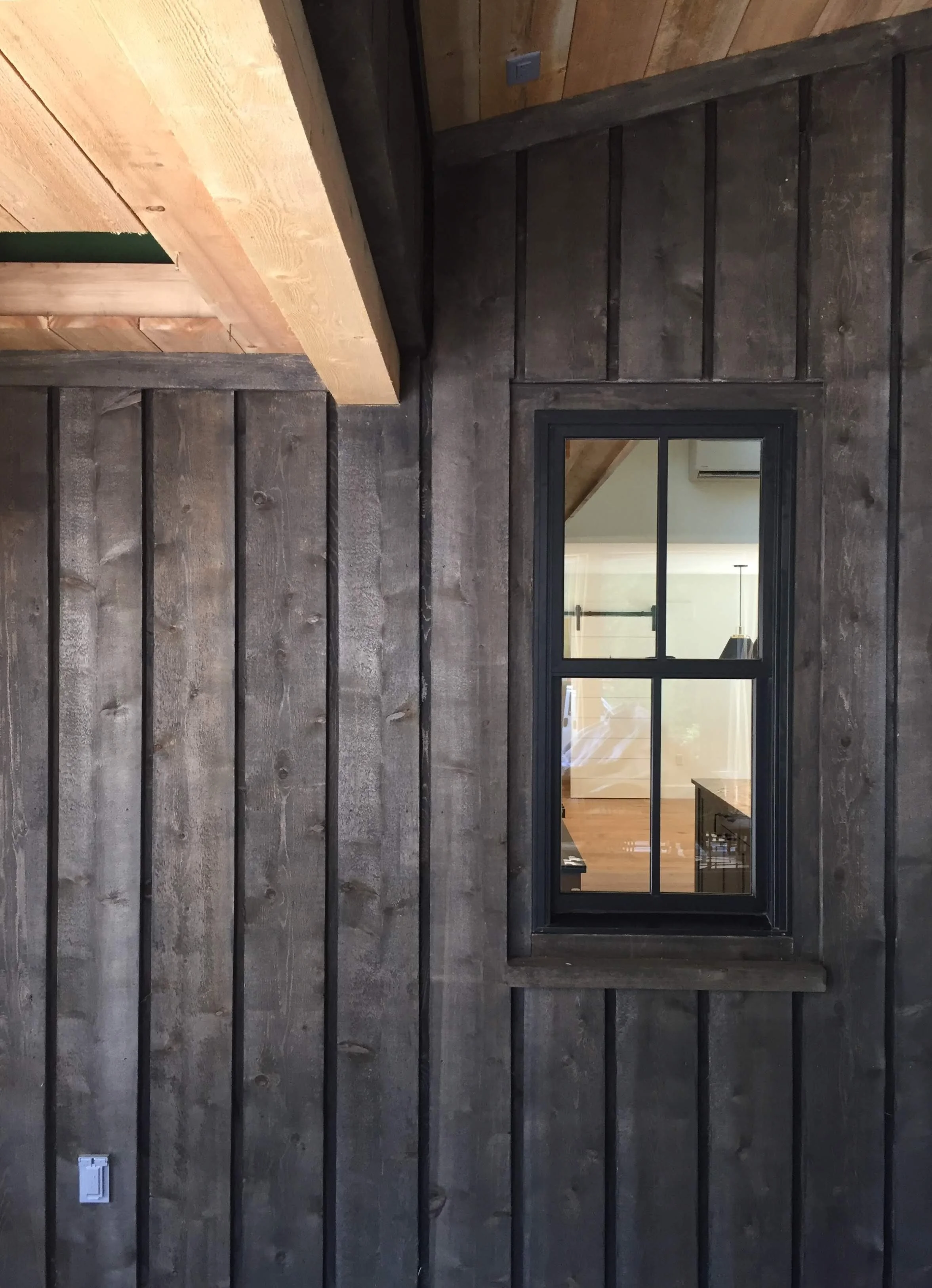Custom cedar siding with black window