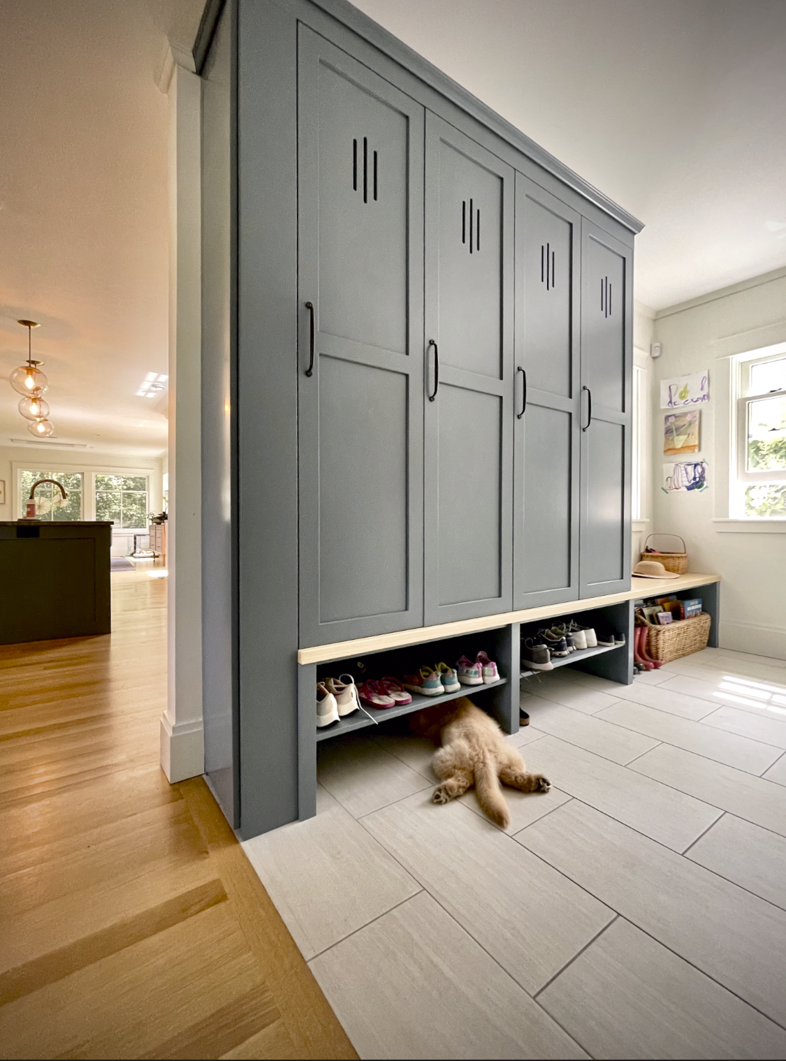 Custom mudroom storage lockers painted in Farrow and Ball De Nimes