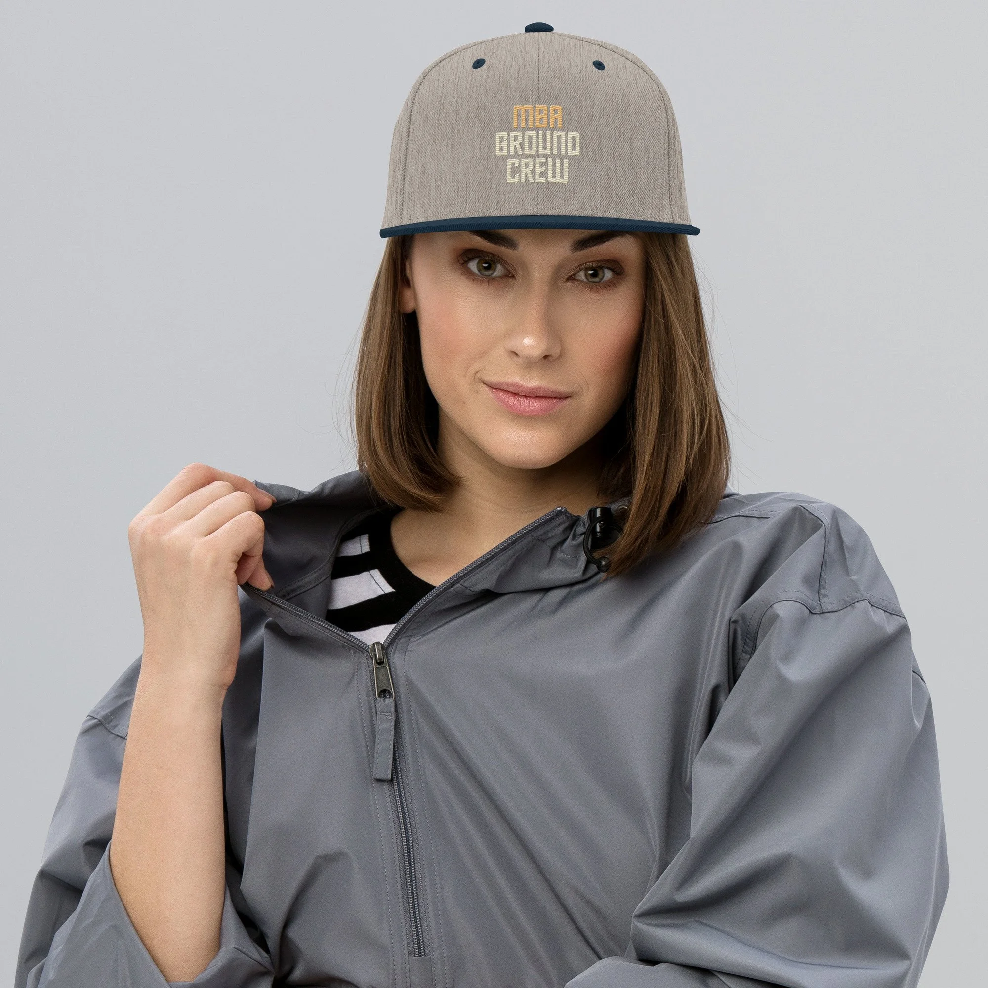 classic-snapback-heather-grey-navy-front-6569b221d9e9e.jpg