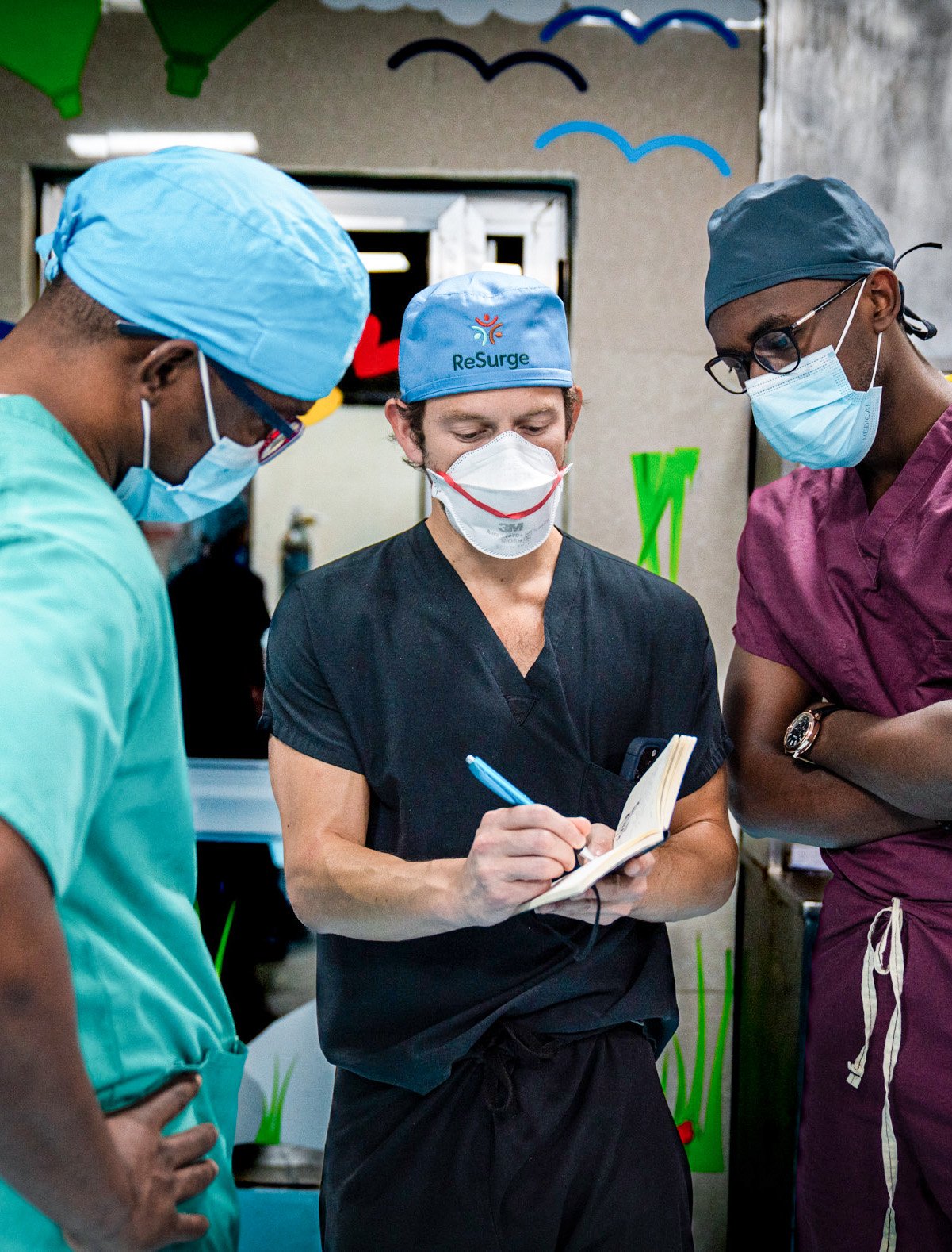A ReSurge trainer with two local surgeons, Ethiopia.