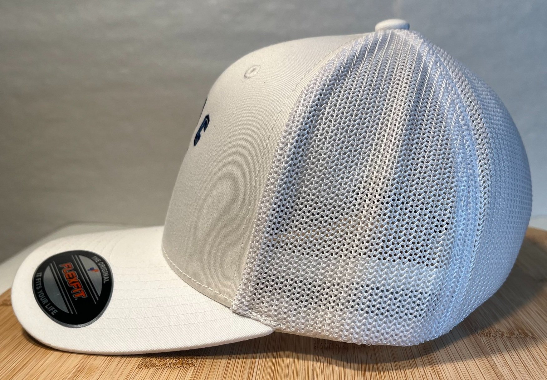 JIBC+White+Flexfit+Training+Cap+side.jpg