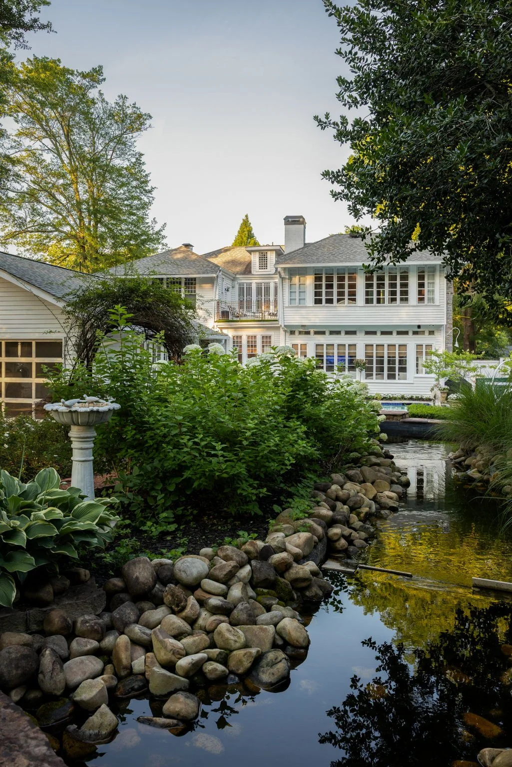 Rear view of a historic Marietta house, with a zen garden and pool.