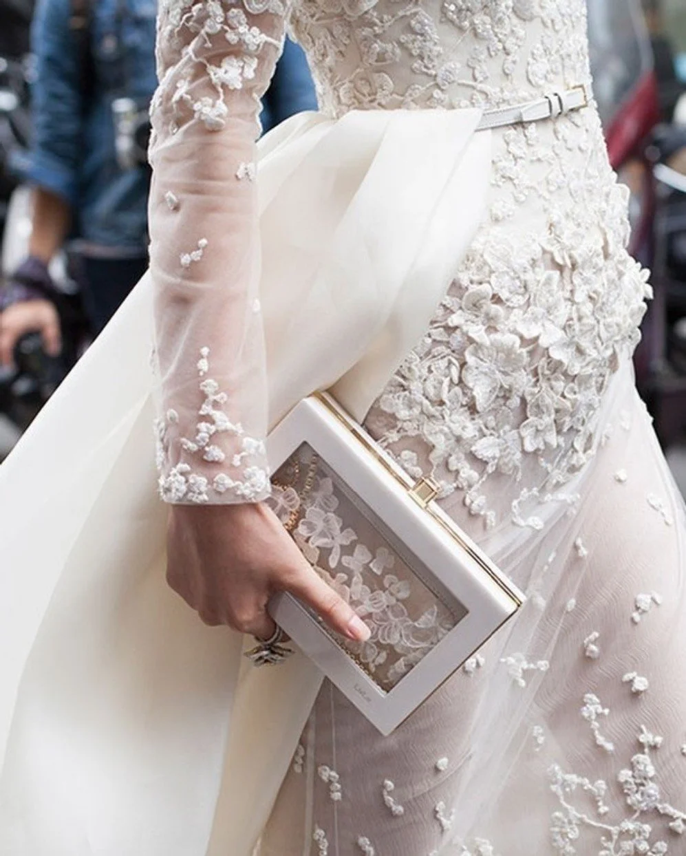 With delicate lace petals floating throughout this gown, it's as though @eliesaabworld is telling spring brides to just embrace the season.