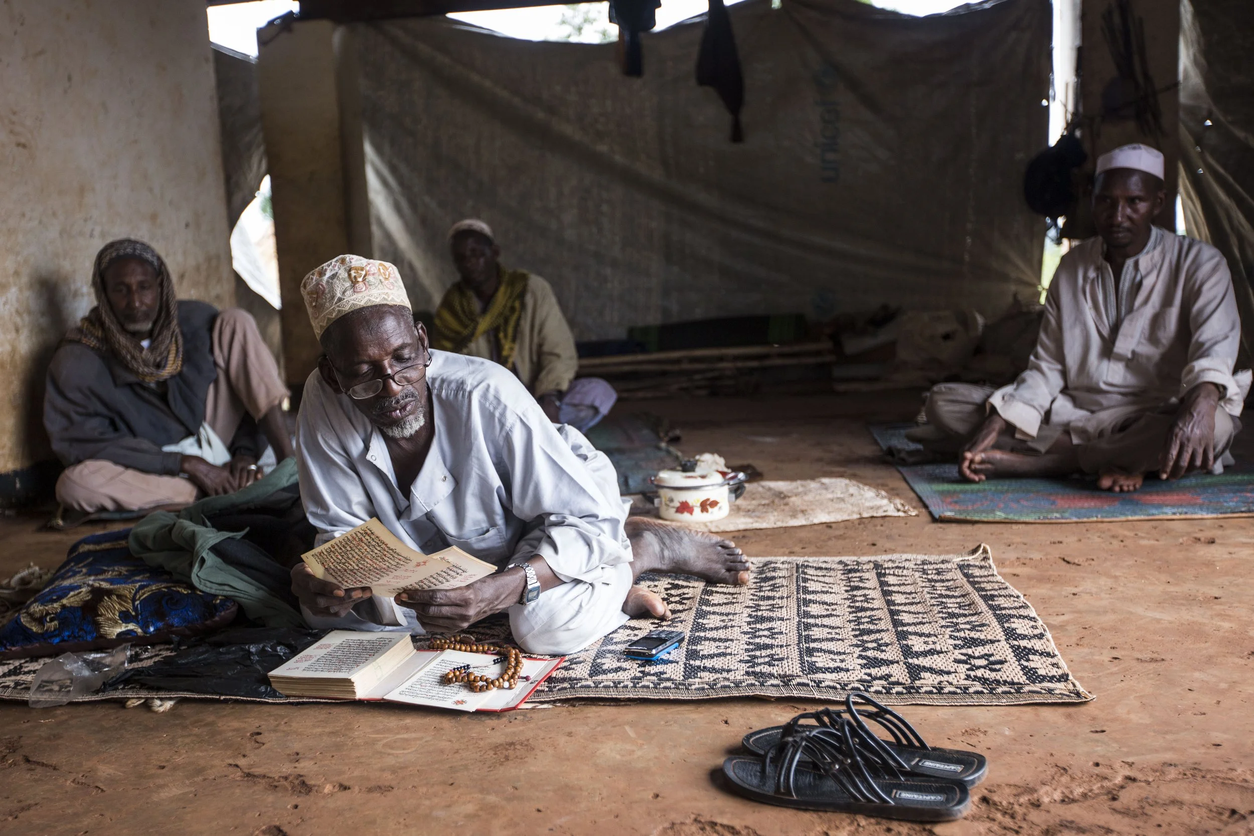 Imam of the enclaved community was himself subject to captivity, violence and abuse before he was freed by a leader of a local militia against cows.