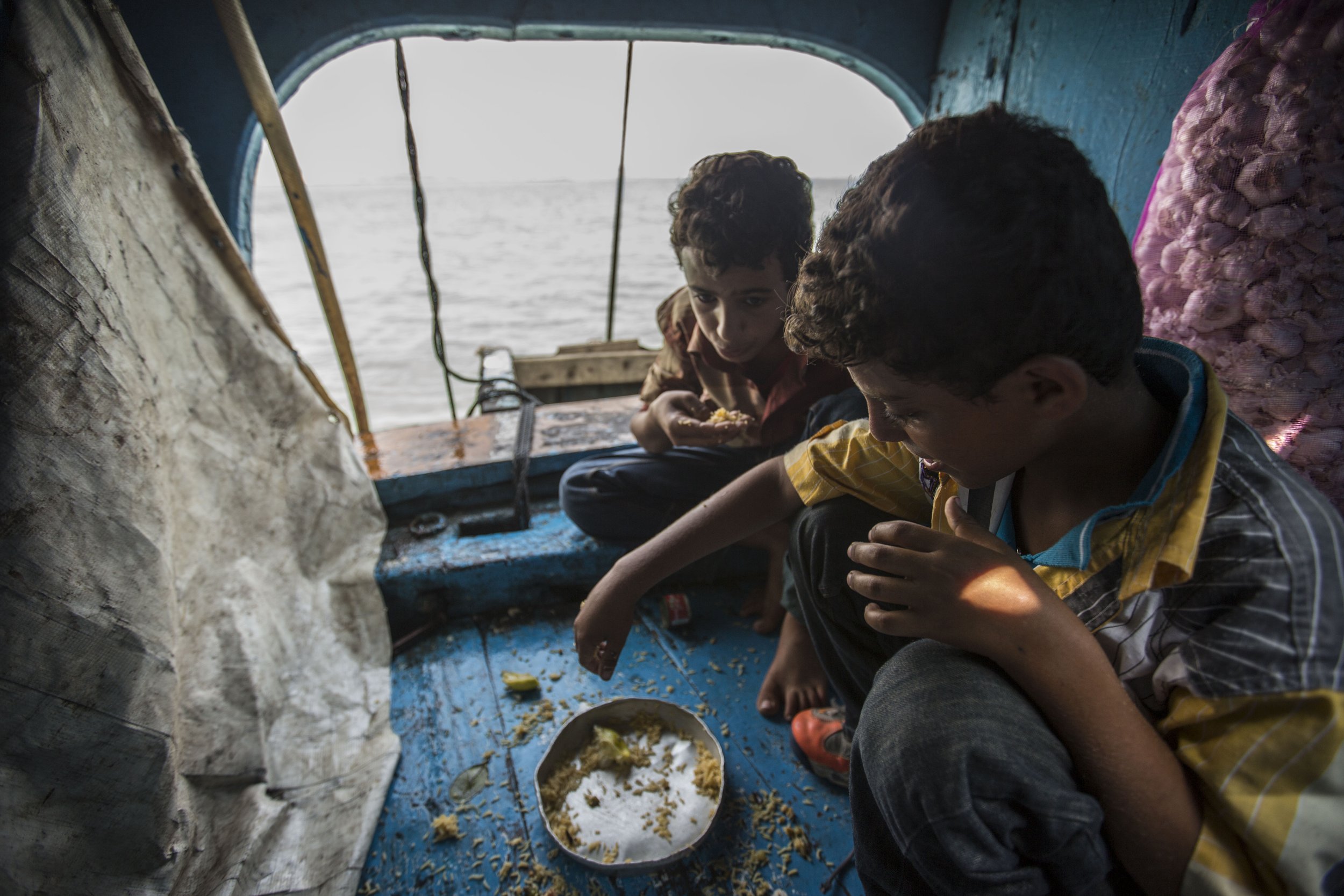 As the boat moored, these two kids came down to the lower cabin to eat. They were instructed by their parents to not give their names to anybody. They also refused to reveal what was their final destination. “Dad said Yemenis could be found anywhere,