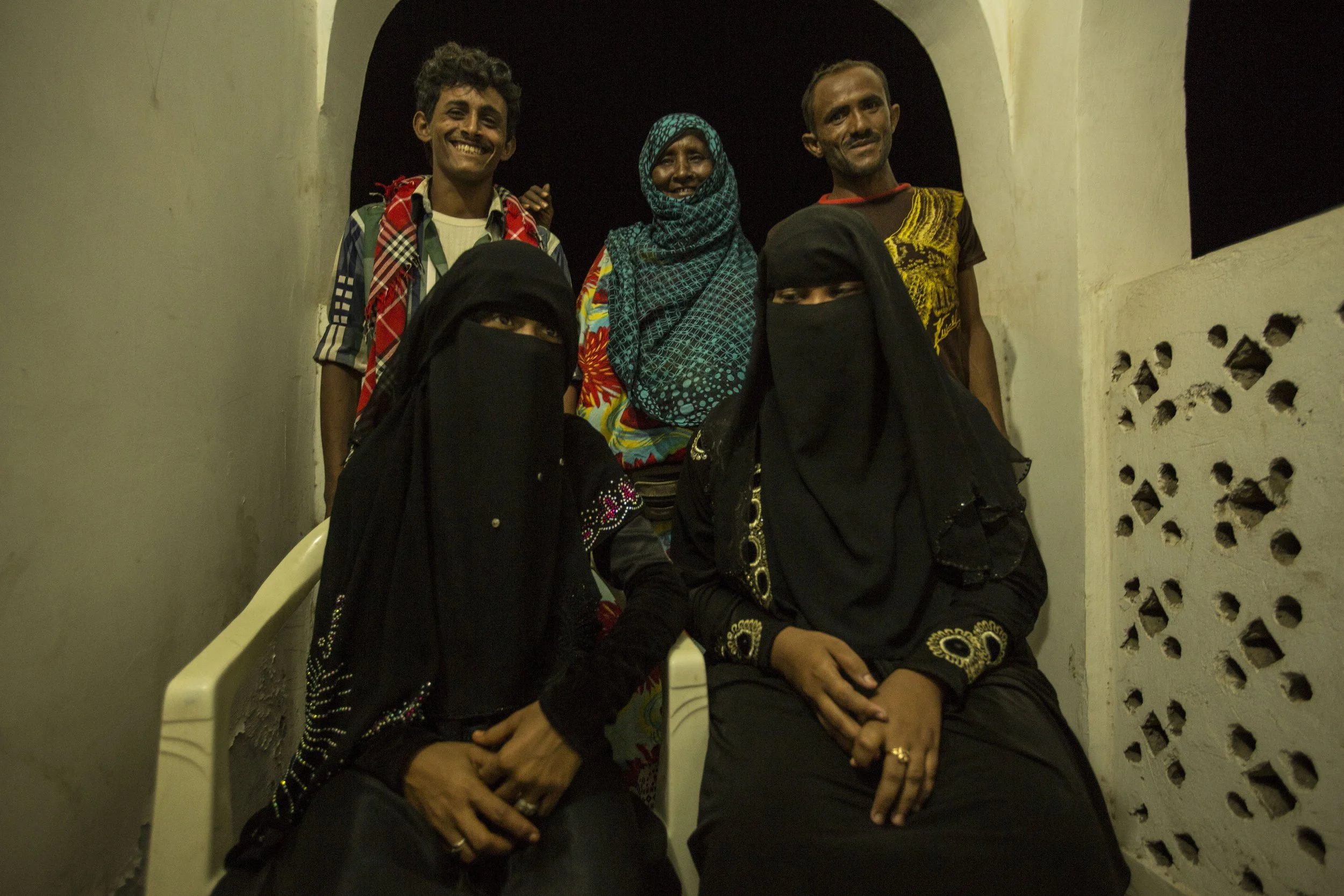 Imad, Mohammed, their respective wives and one mother-in-law pose for souvenir pictures outside  Obock's registry office where they just registered their marriages. “Elderly men and women tell us that life must go on, and I agree, but I cannot help t
