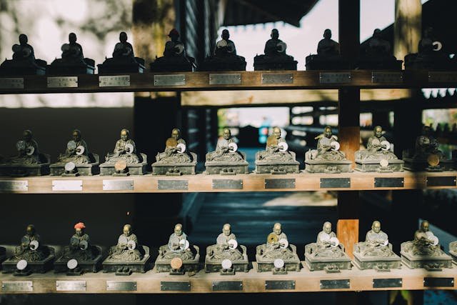 Small Buddha statues in Hiroshima representing peace and remembrance.