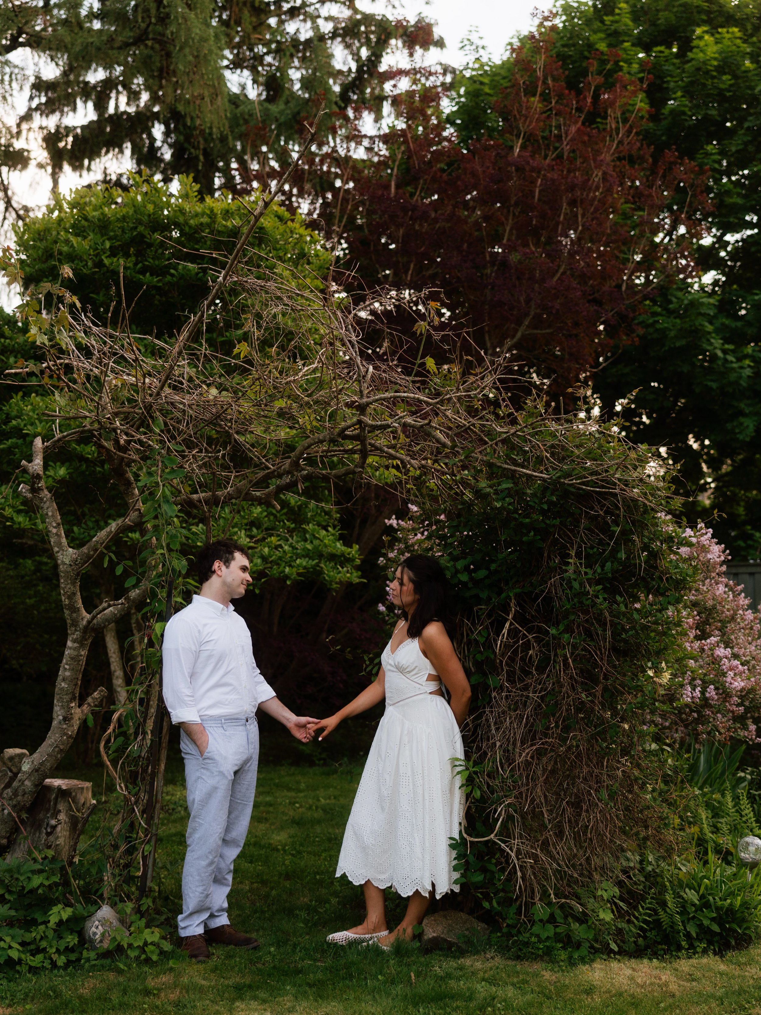 Emma and Ben 🫶✨ Would you believe this magical garden is their sweet neighbors backyard?! A real life fairytale. Had the sweetest time swinging and frolicking with these two. Can&rsquo;t wait for your wedding! 💍