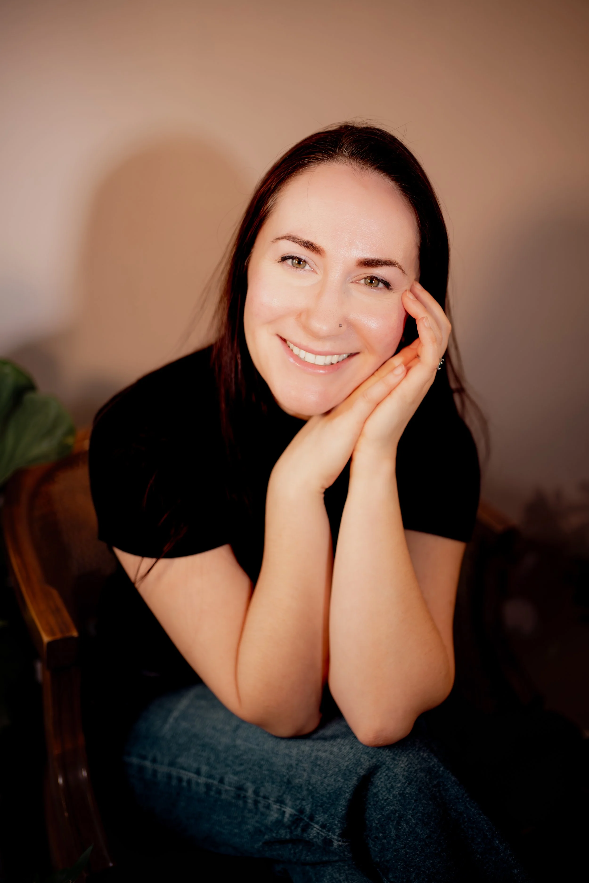 Sara Kali in her Austin Pilates studio, offering personalized brain-to-body connection coaching.