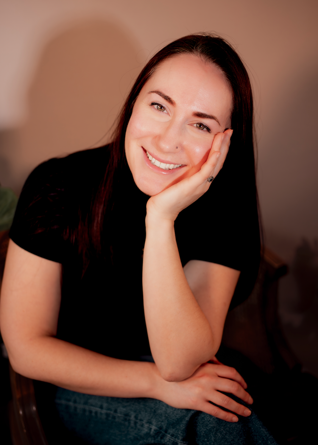 Portrait of Sara Kali, a certified Pilates instructor focusing on brain-to-body connection.