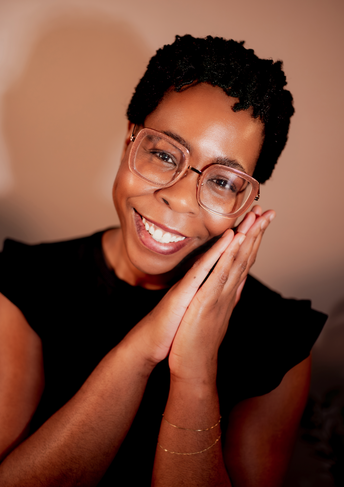 Portrait of Evonne Muoneke, a restorative yoga guide and sound healing practitioner at Bliss Studio.