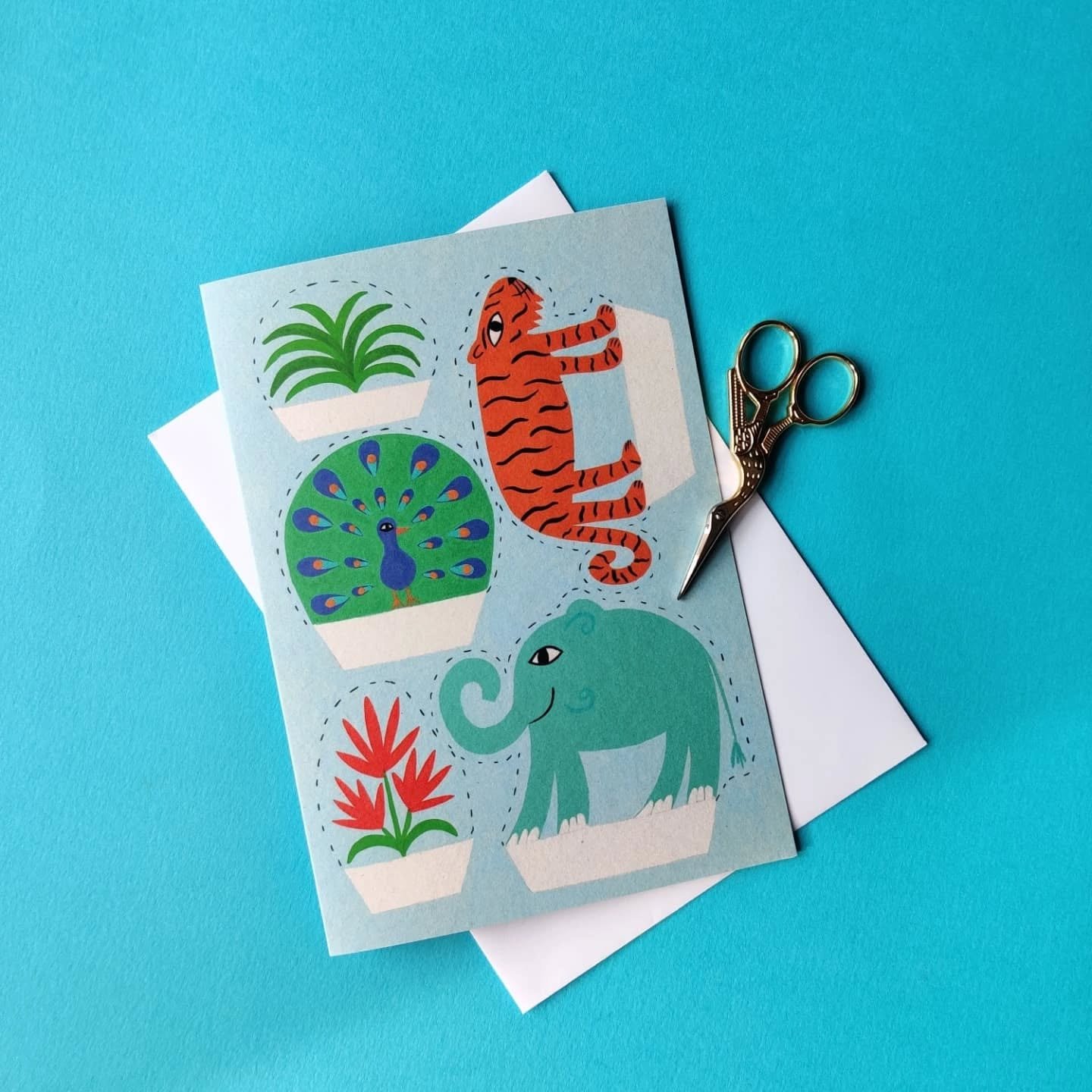 Cut out and fold jungle...
This has been so much fun to make! 🐅🐘🦚🌴 
And is for anyone who would like their very own mini jungle. It's an A5 card on lovely paper stock which is made from recycled coffee cups and cuts well.
It's now in my Etsy shop