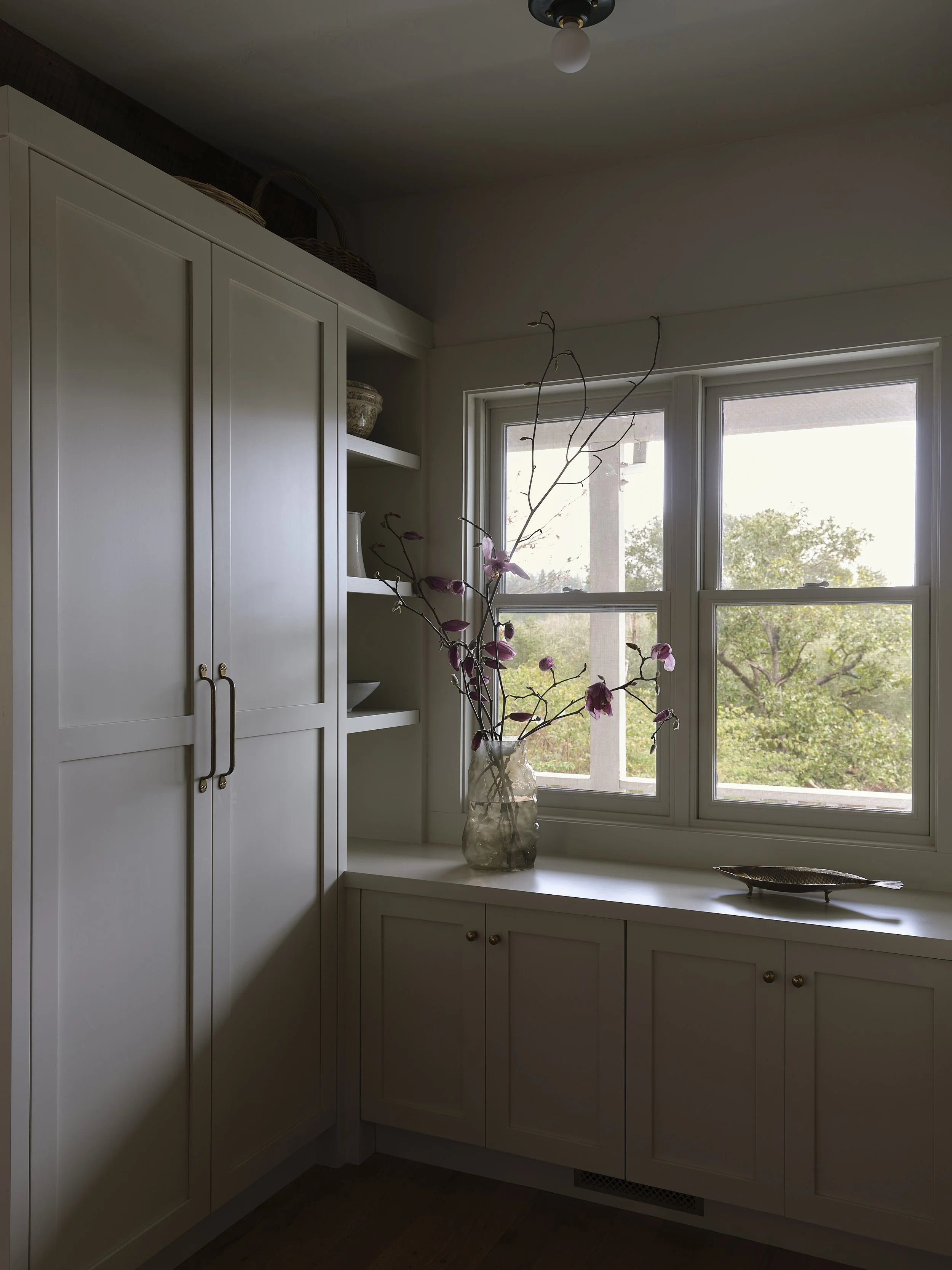 Closets with small window to the outside.