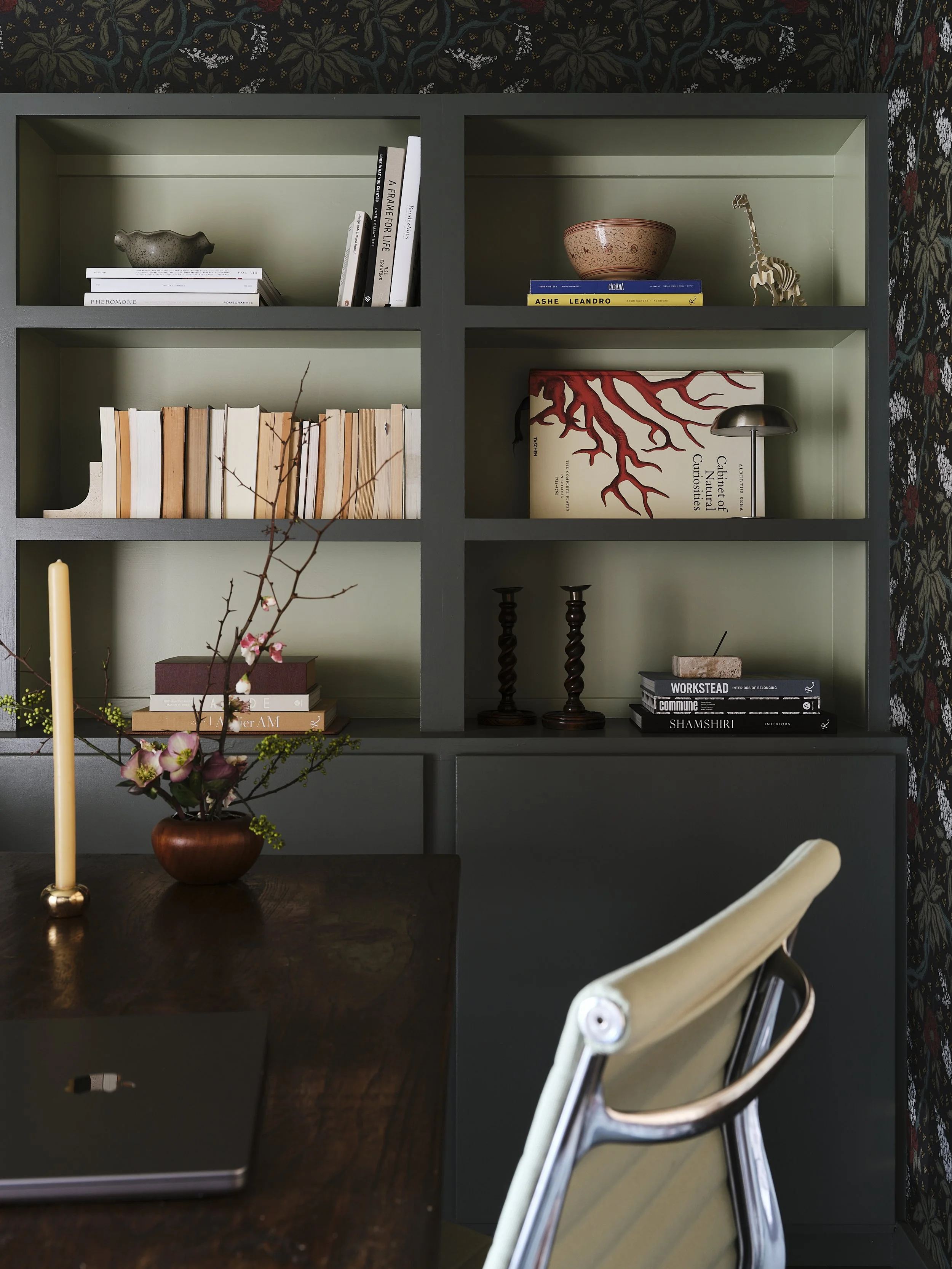Bookcase and office chair and desk.