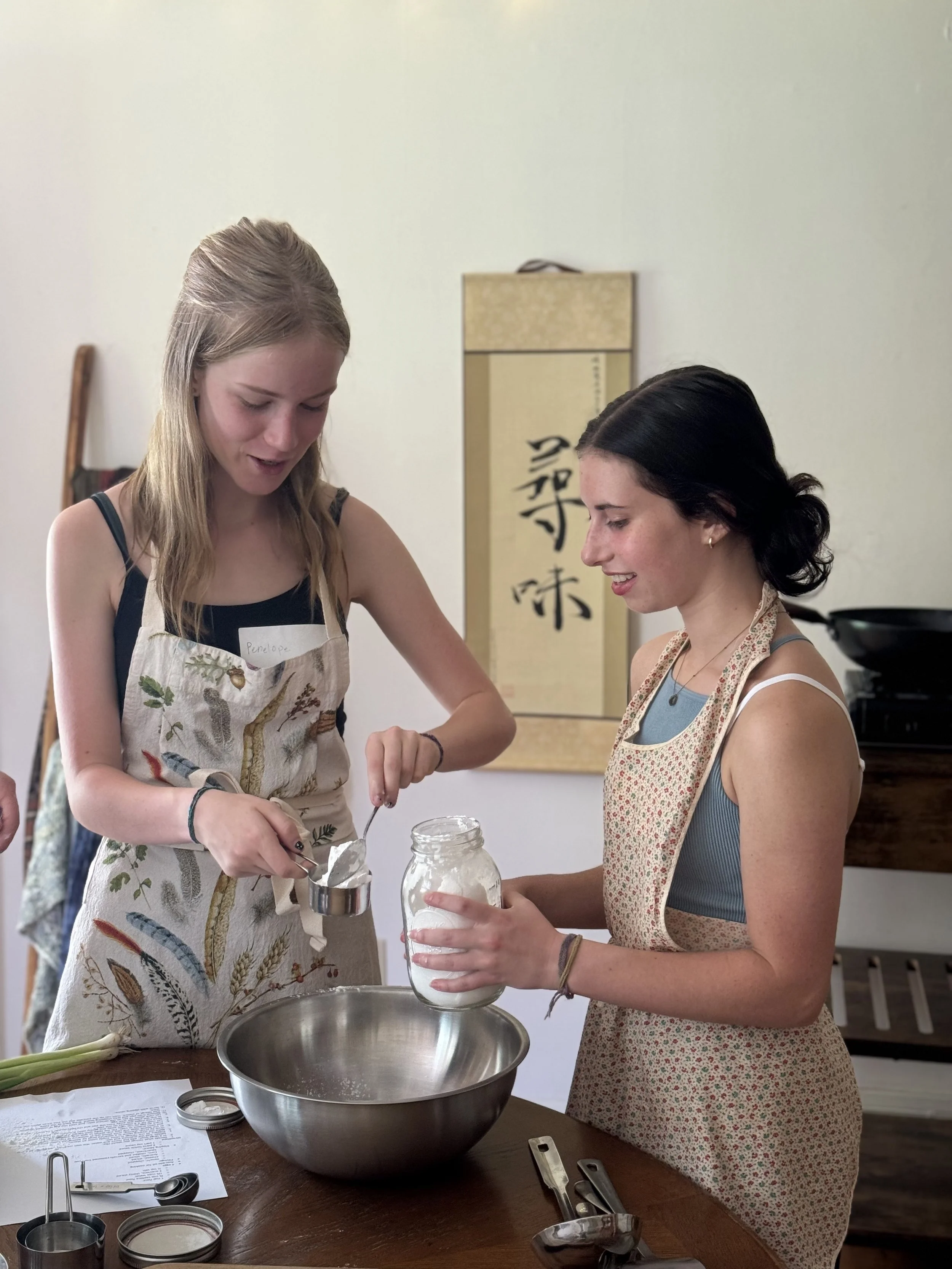 teens measure flour.jpg
