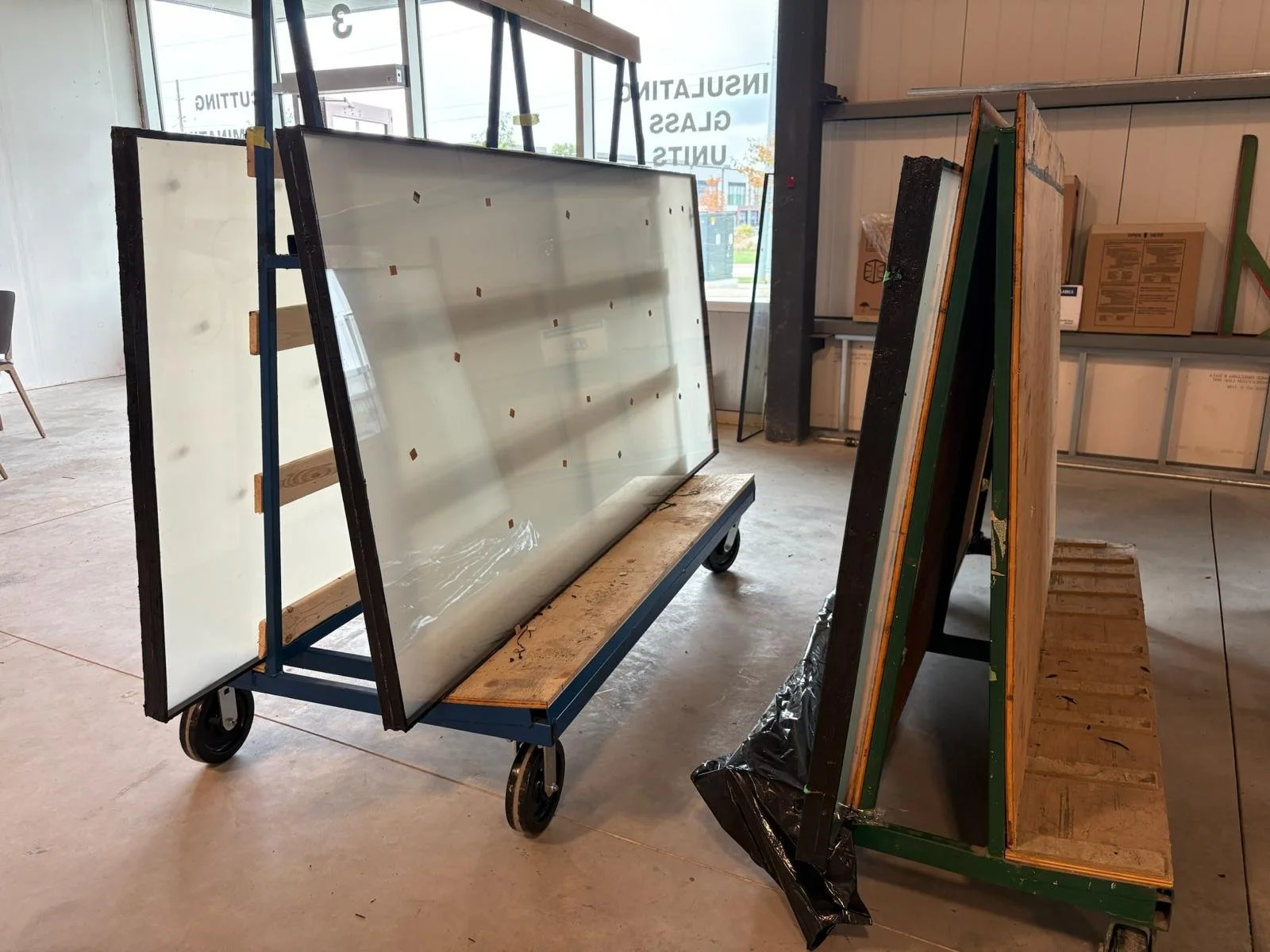 Insulated glass unit cross-section showing aluminum spacer bar and desiccant, manufactured in Ontario.