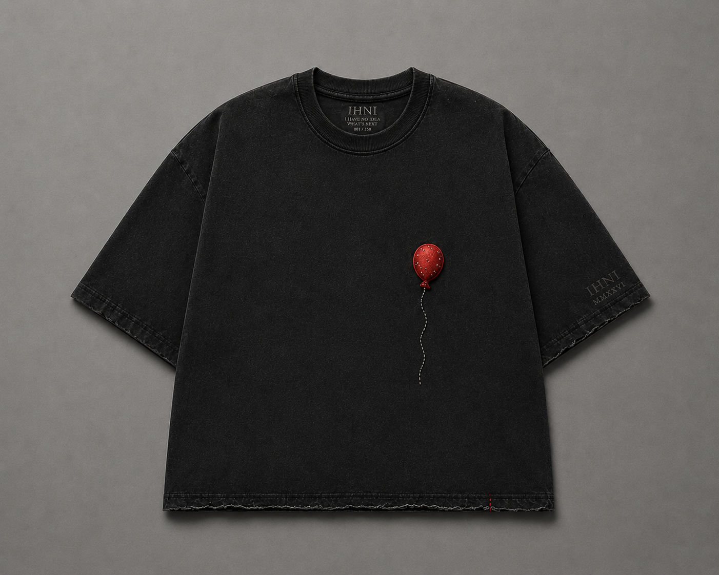 Minimalist vintage black T-shirt flat lay.png