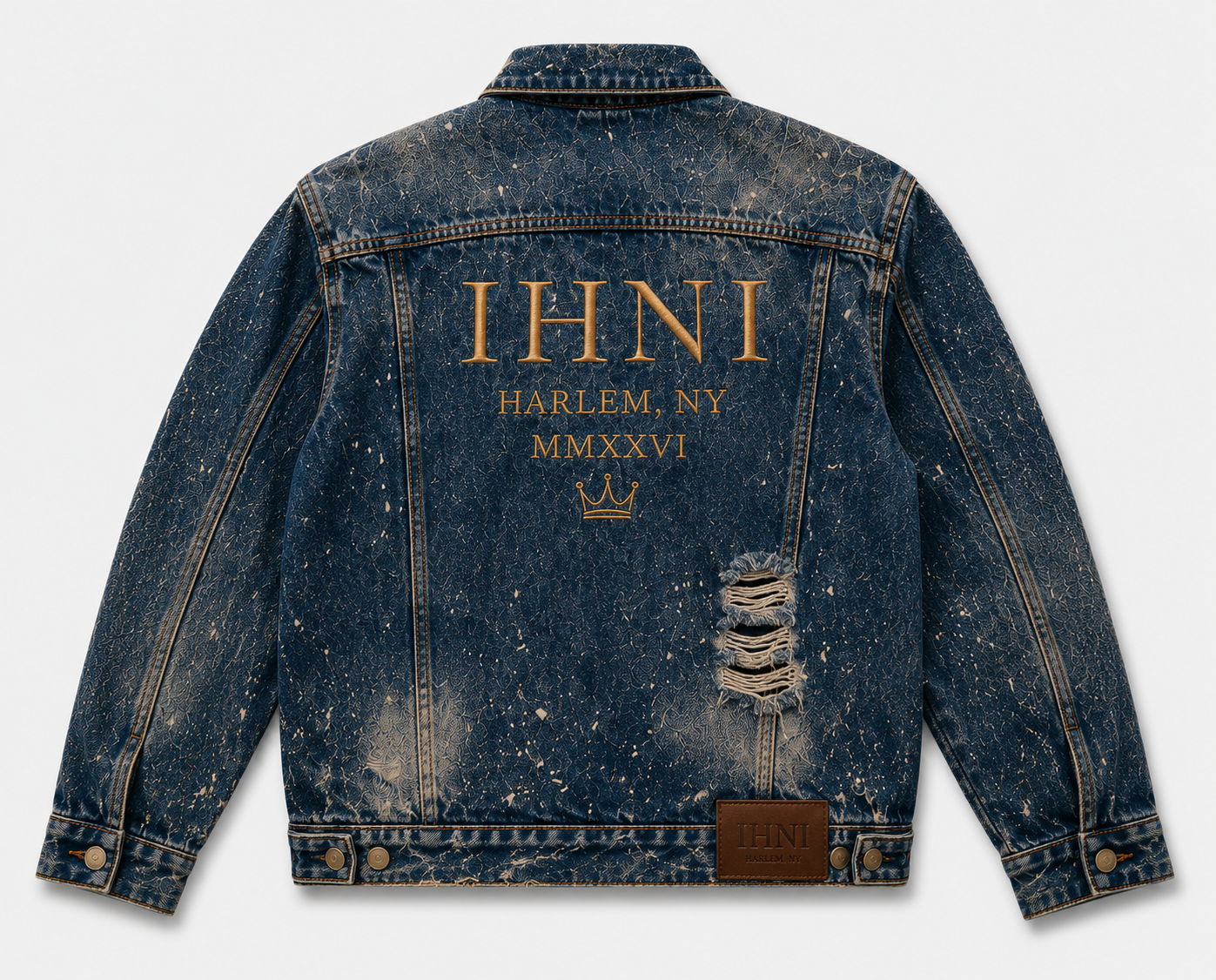 Distressed denim trucker jacket flatlay.png