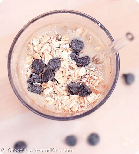 aerial view of cookie dough protein shake topped with oats and chocolate chips