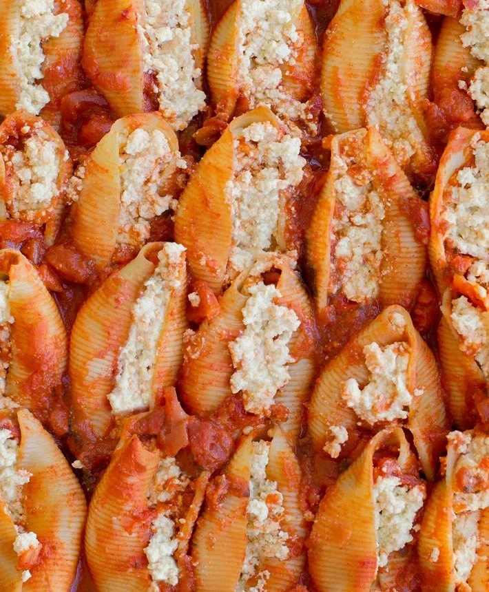 cooked tofu stuffed shells with red sauce