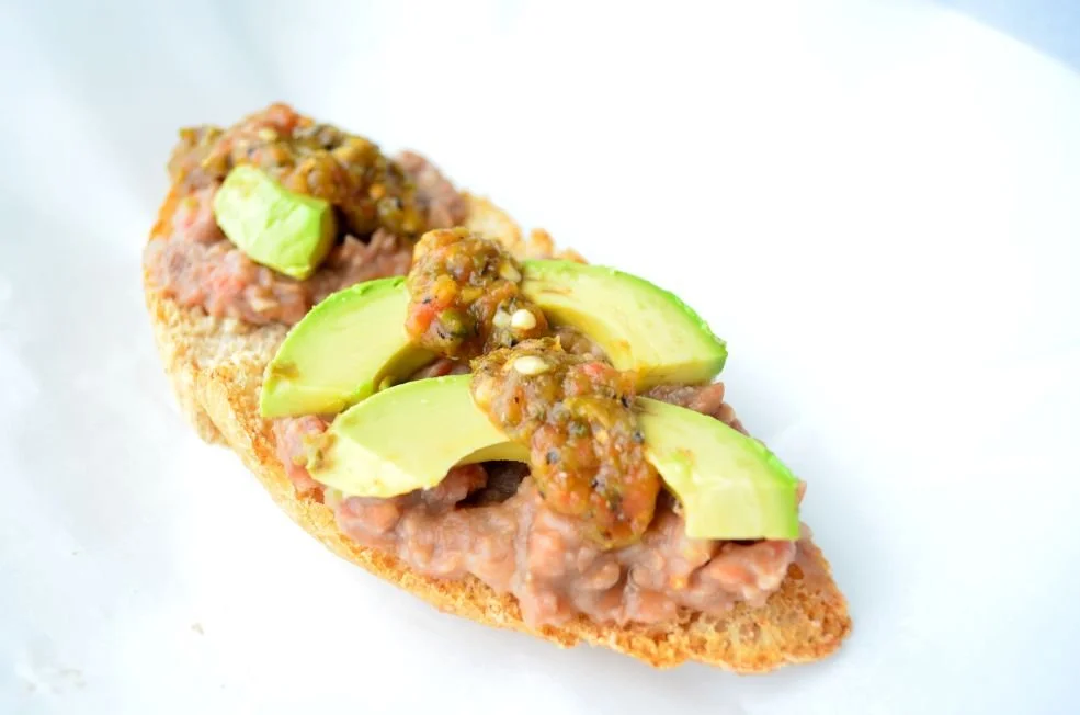 SPICY BEAN AVOCADO TOAST (MOLLETES)