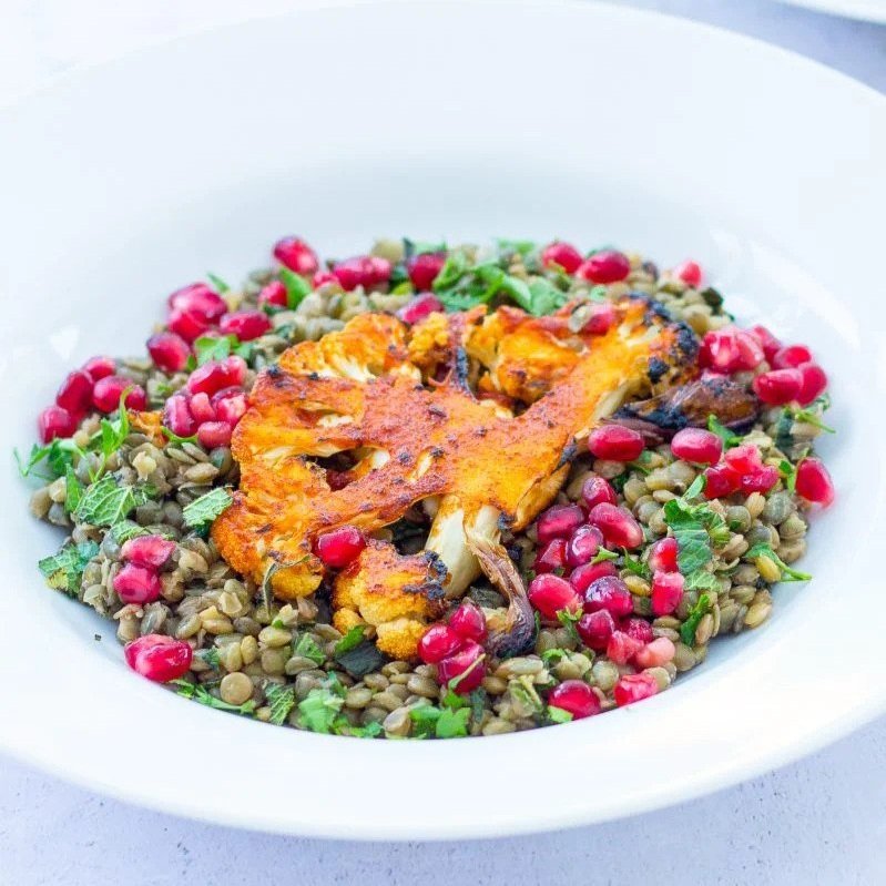 HARISSA SPICED CAULIFLOWER STEAKS WITH HERBY GREEN LENTILS