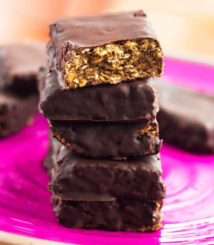 stack of no bake chocolate oatmeal protein bars