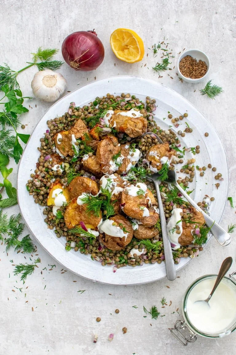 CRISPY SMASHED POTATOES WITH HERBY LENTILS