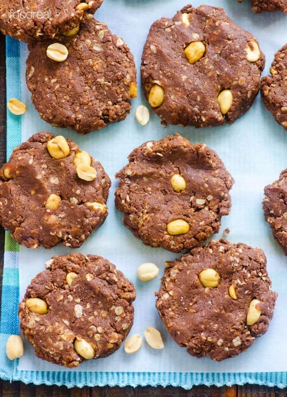 Chocolate peanut butter cookies with white chocolate chips on a blue cloth