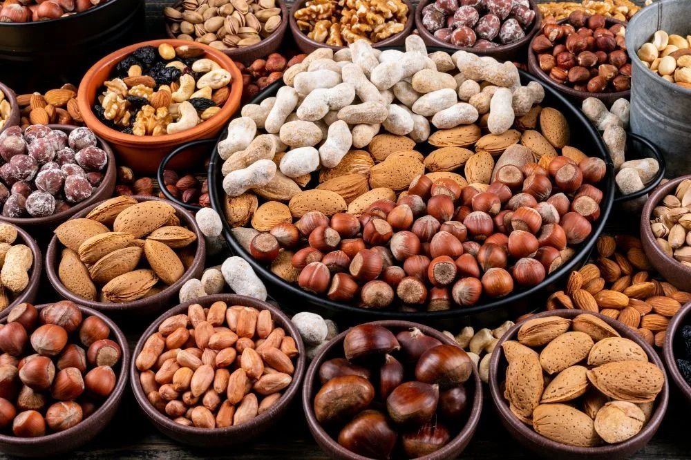 set of pecan, pistachios, almond, peanut, cashew, pine nuts and assorted nuts