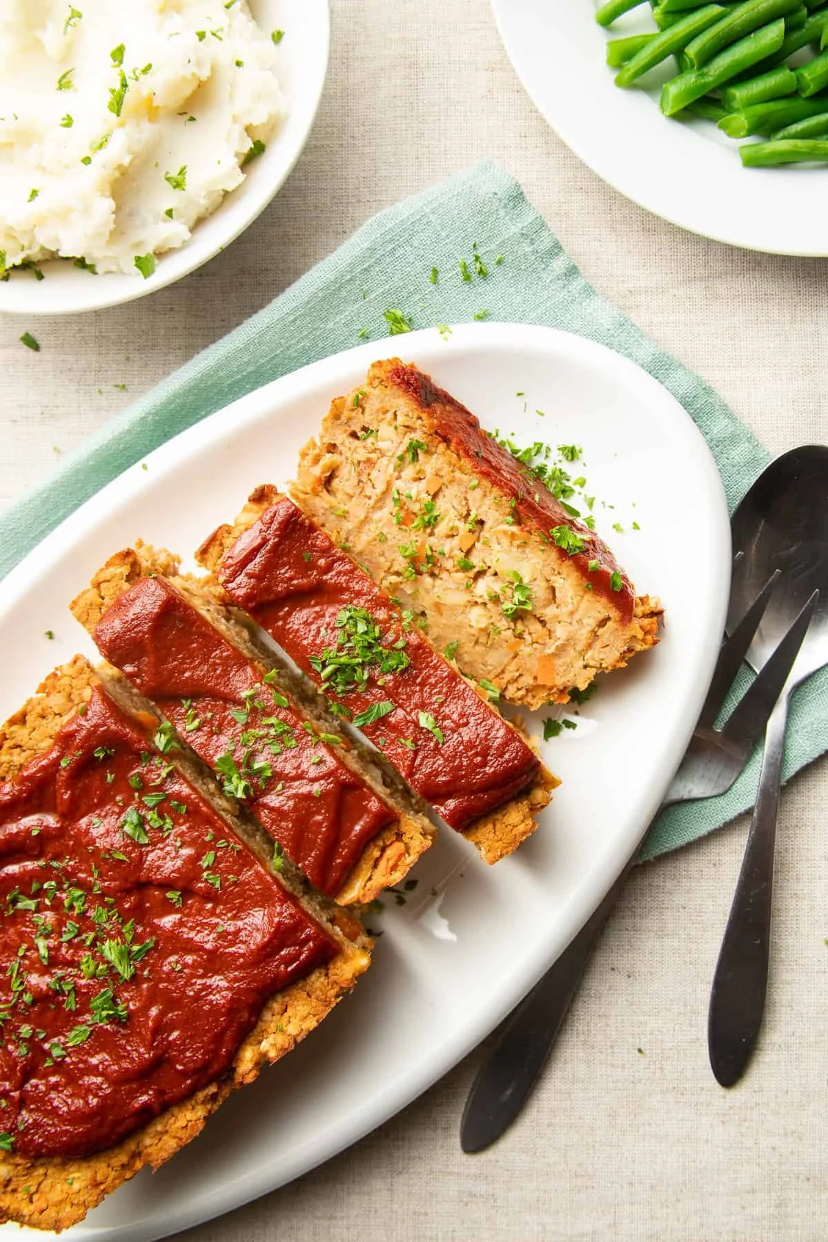 plated and sliced chickpea vegan meatloaf