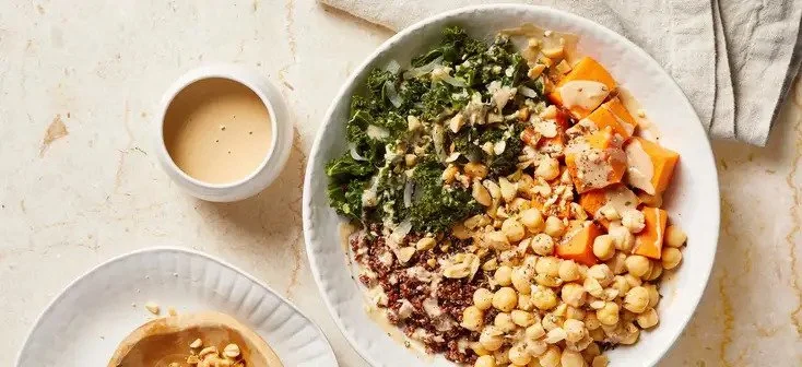 QUINOA CHICKPEA SWEET POTATO BOWLS WITH PEANUT SAUCE