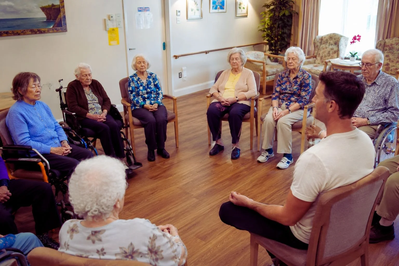 Meditation for seniors during a guided wellbeing session in an aged care facility