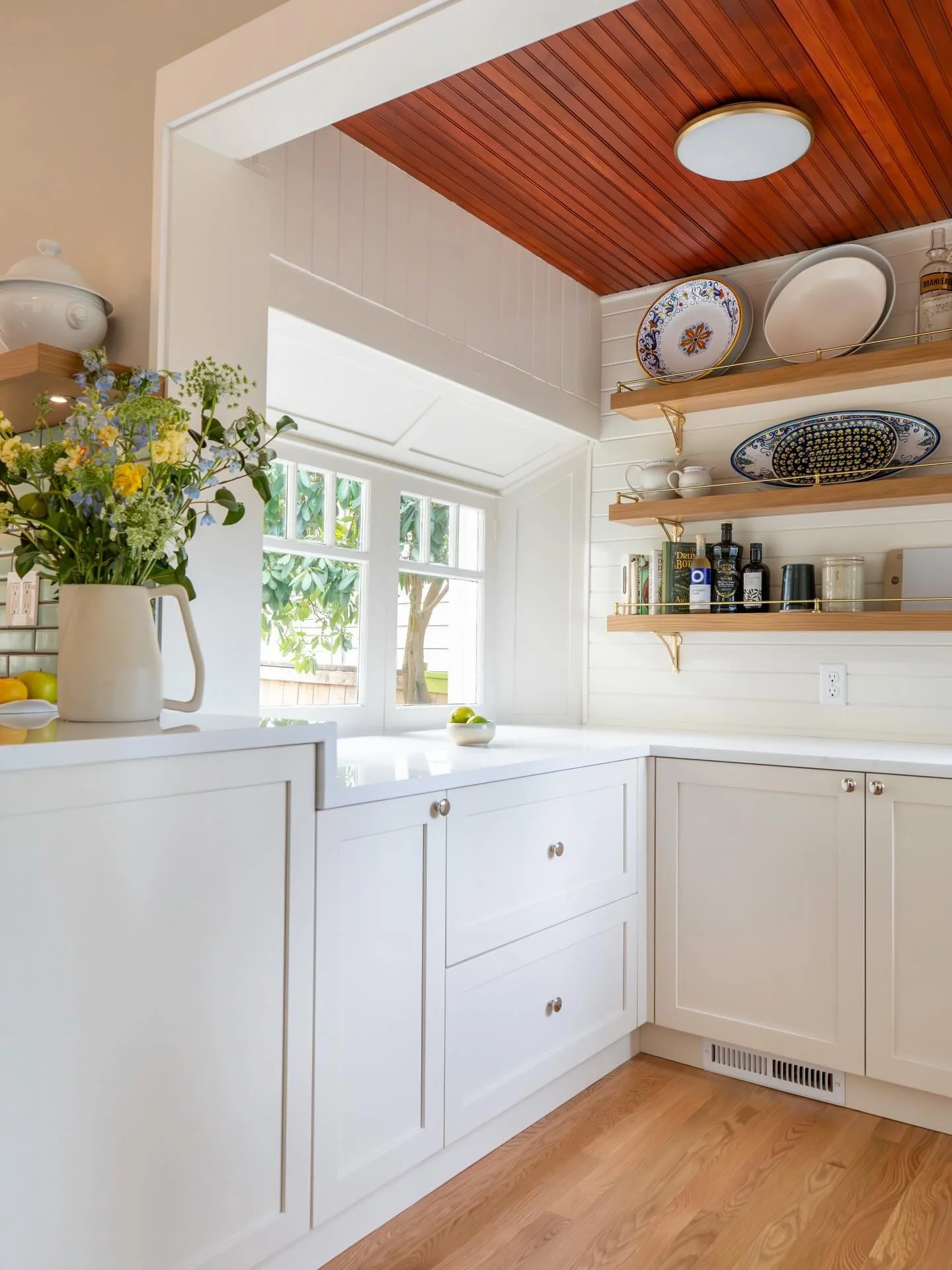 For our client who loves to bake, transforming their nook into a light, bright, and functional extension of the kitchen was such a win. Bonus points for the kneading height, deep countertop with drawer-in-drawers below designed to fit all of the roll
