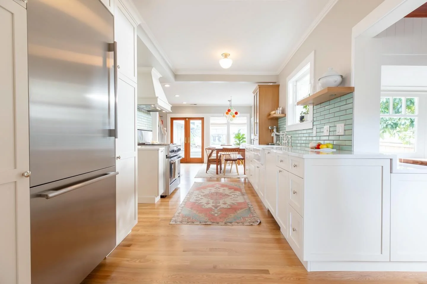 Welcoming the light into this 1912 craftsman kitchen, and bidding farewell to those floating peninsula uppers (swipe for before!) 💫🩵
