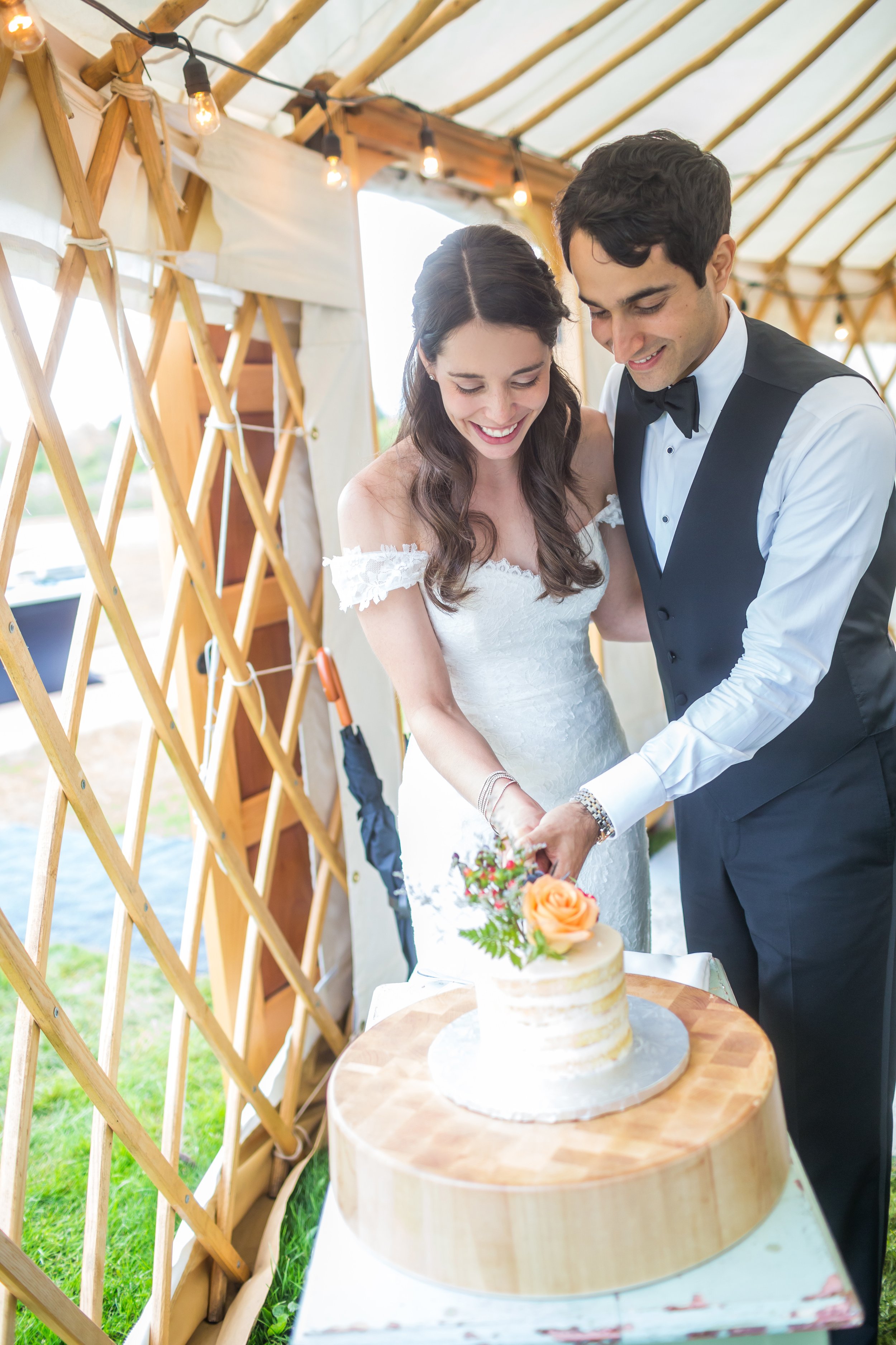 yurt-rental-nova-scotia-outdoor-wedding-cutting-cake.jpg