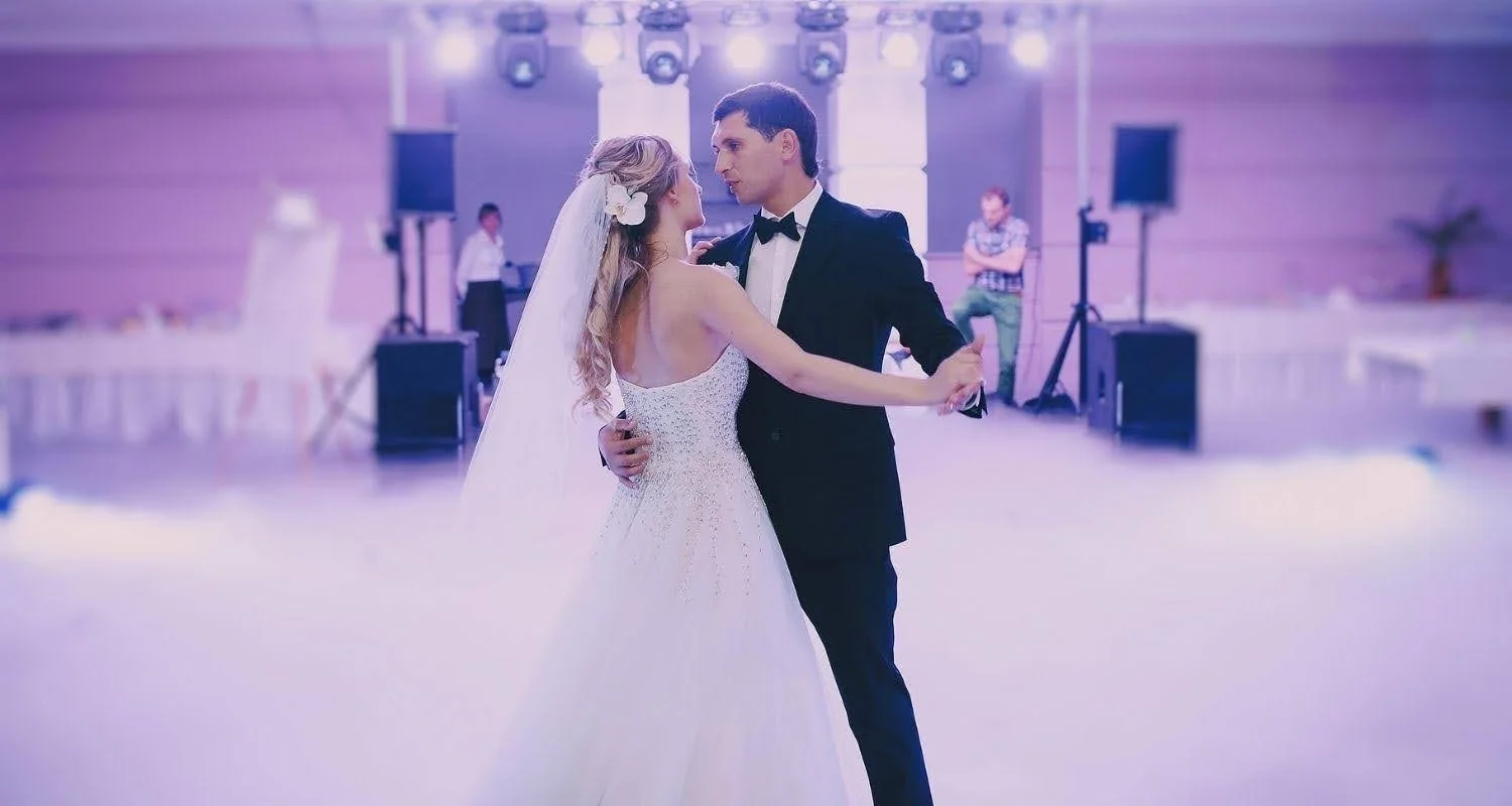 Bride and groom dancing their first dance after wedding dance lessons in Marbella