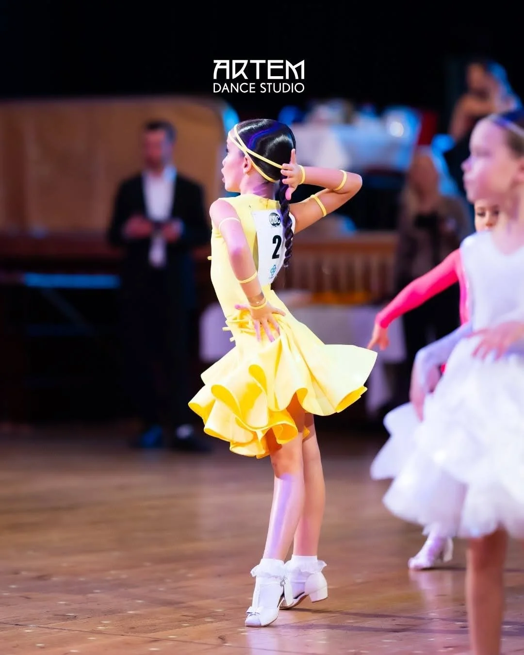 Young ballroom dancers performing during a dancing in Marbella event at Artem Dance Studio.