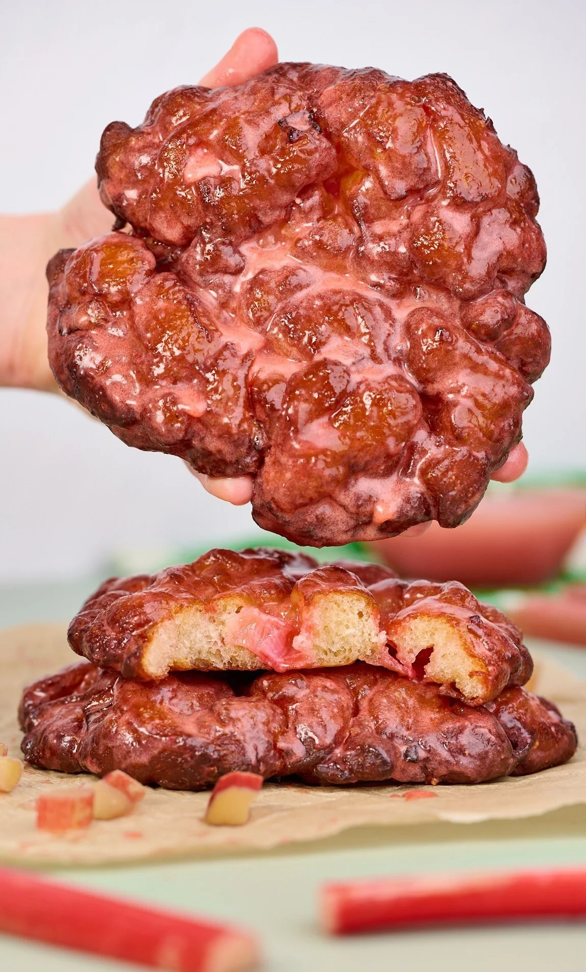 rhubarb fritters rhubarb recipes apple fritters donut shop fritters homemade donuts spring baking doughnuts rhubarb baking rhubarb recipes strawberry glaze best donut recipes