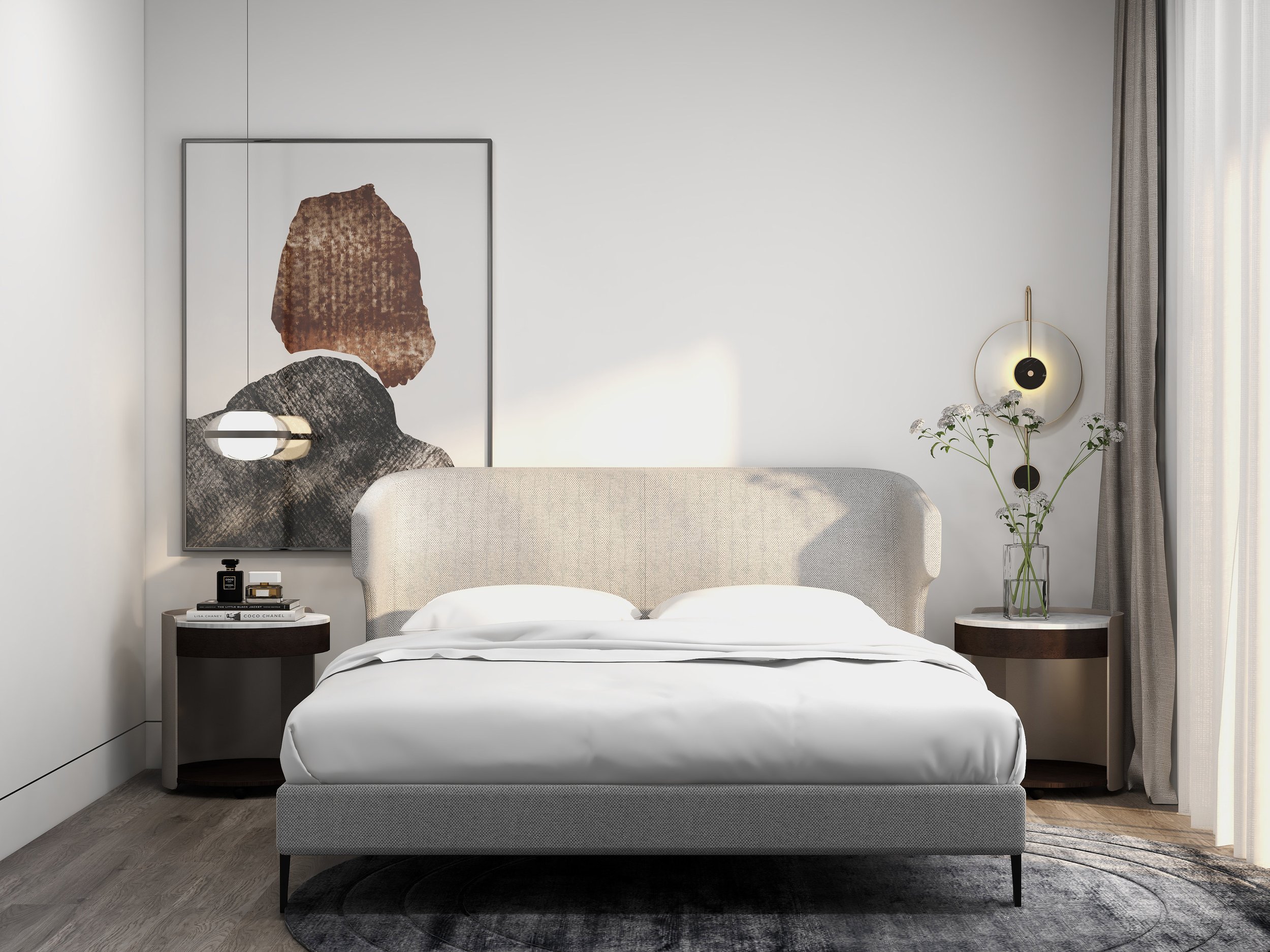 Modern bedroom with a gray upholstered bed, abstract wall art, round bedside tables, a vase with flowers, and a circular wall light fixture.