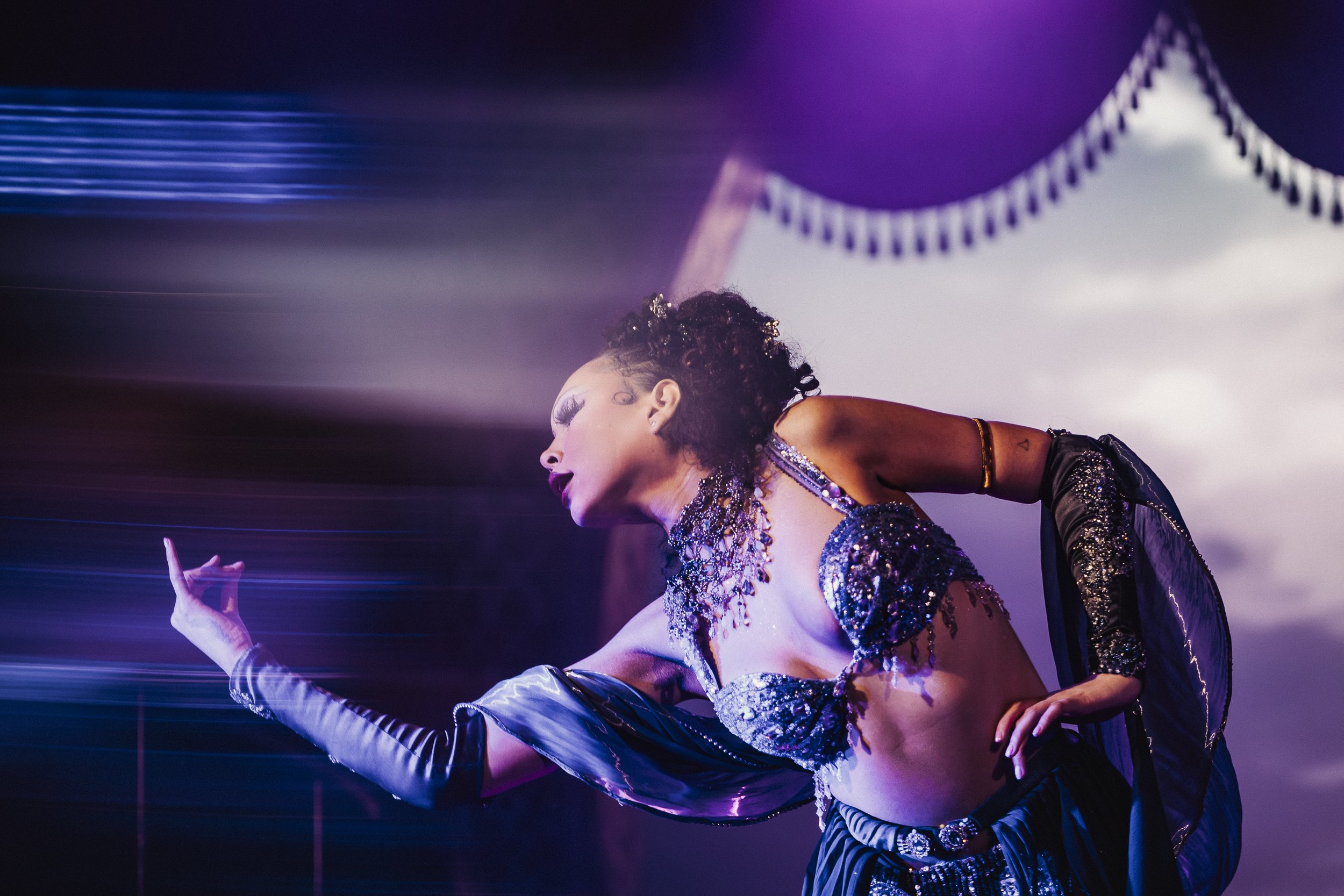 Burlesque performer in a custom Prangsta costume at the Emerald Theatre, London, in a luxury cabaret show created by Secret Productions.