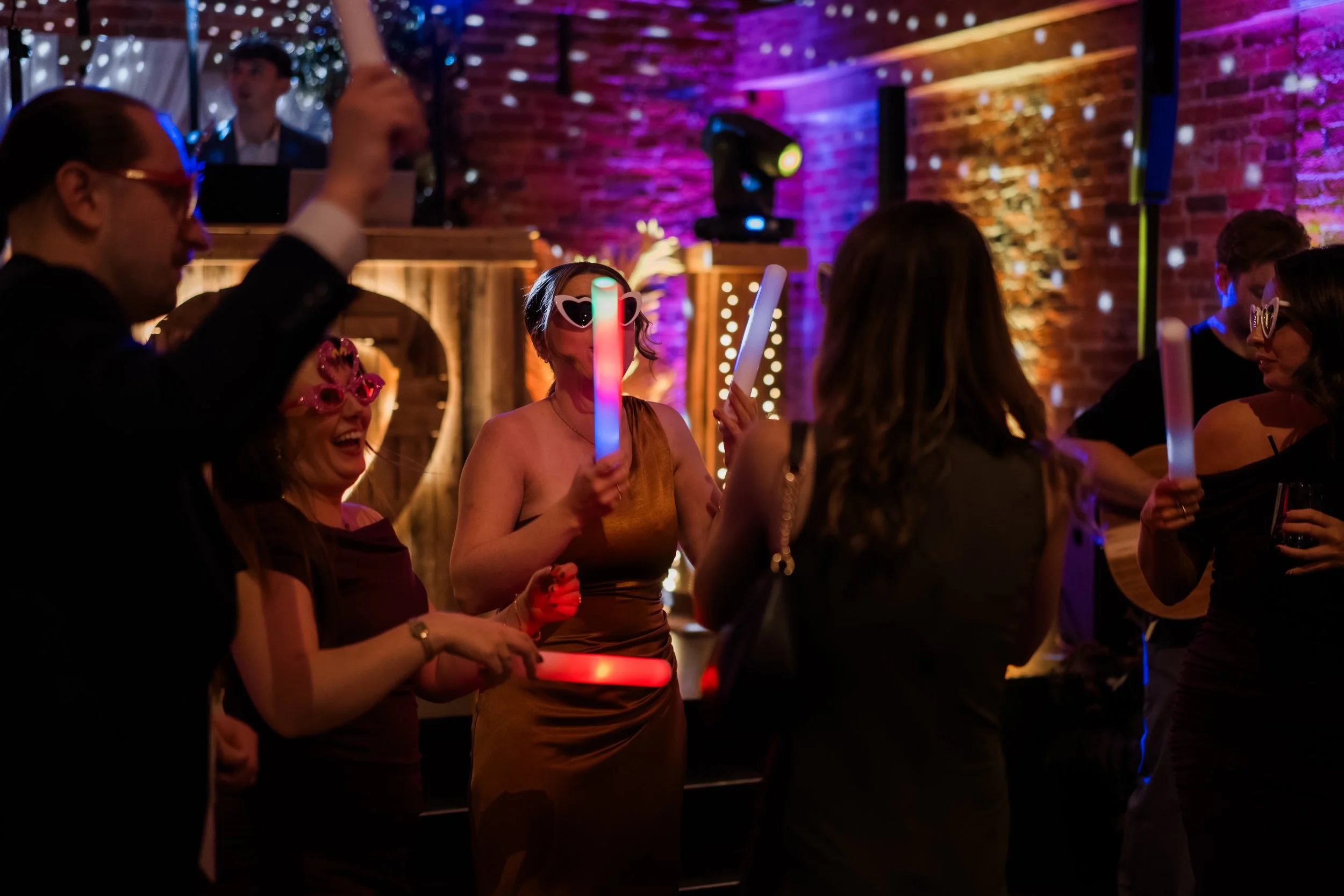 Wedding guest on the dancefloor ambient lighting without flash
