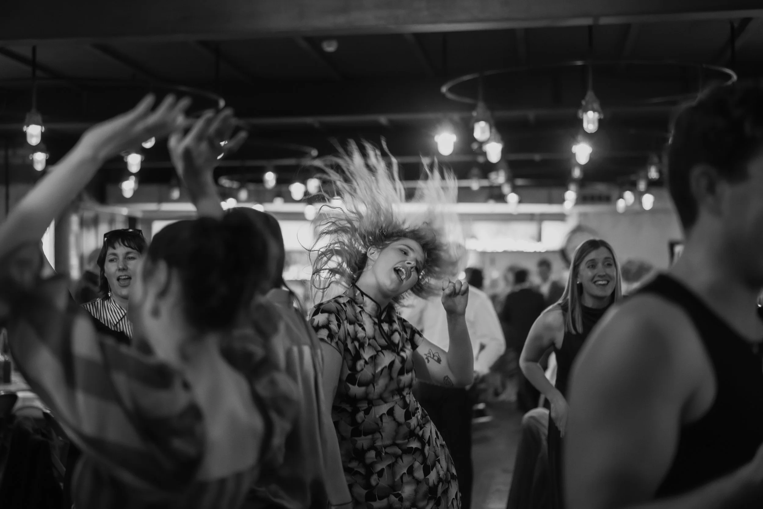 Blacka and white shot wedding guest hair flip dancing no flash Yorkshire