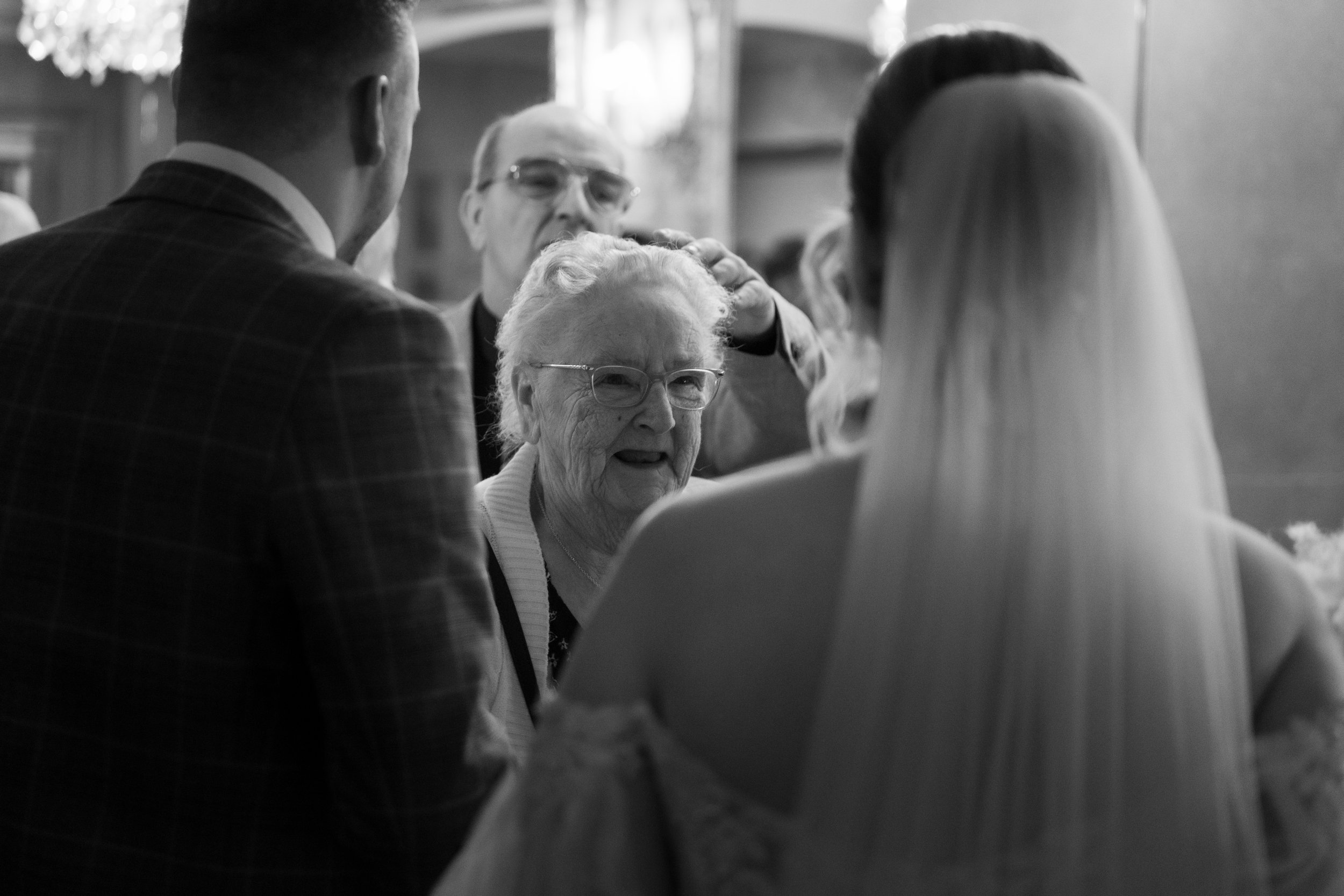 L&J Wedding Photography and Videography. Gran smiling at bride. Yorkshire wedding. Fine art. Natural beautiful.