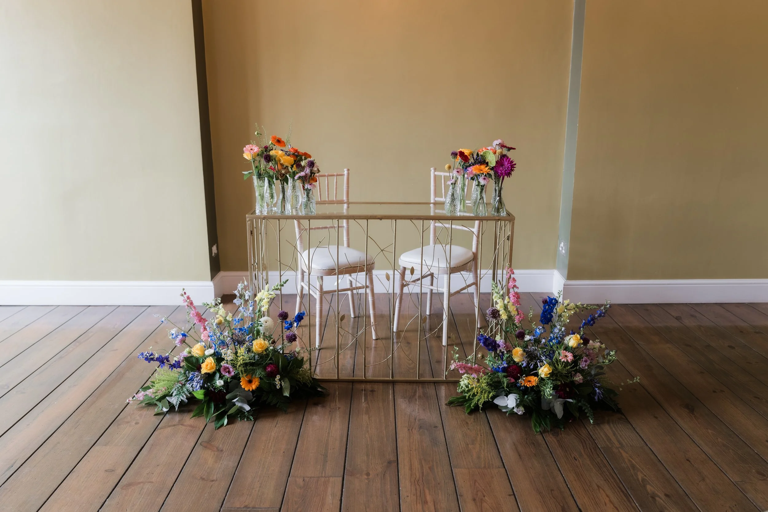 L&J Wedding Photography & Videography. Documentary Yorkshire Weddings.  Table details with flowers at Hodsock Priory
