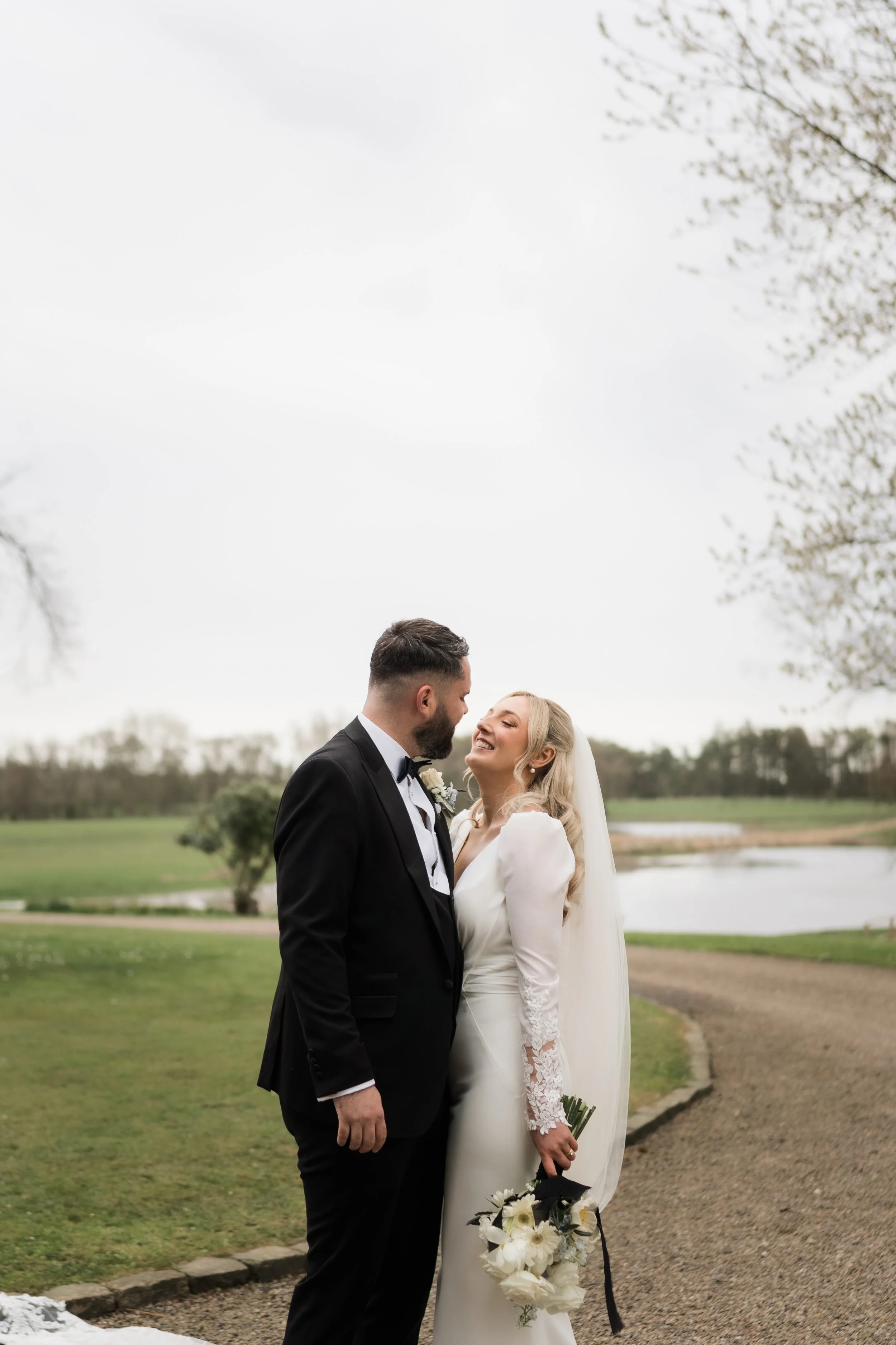 Editorial-style wedding portraits captured in a documentary way, with the couple exploring the grounds of Charlton Hall