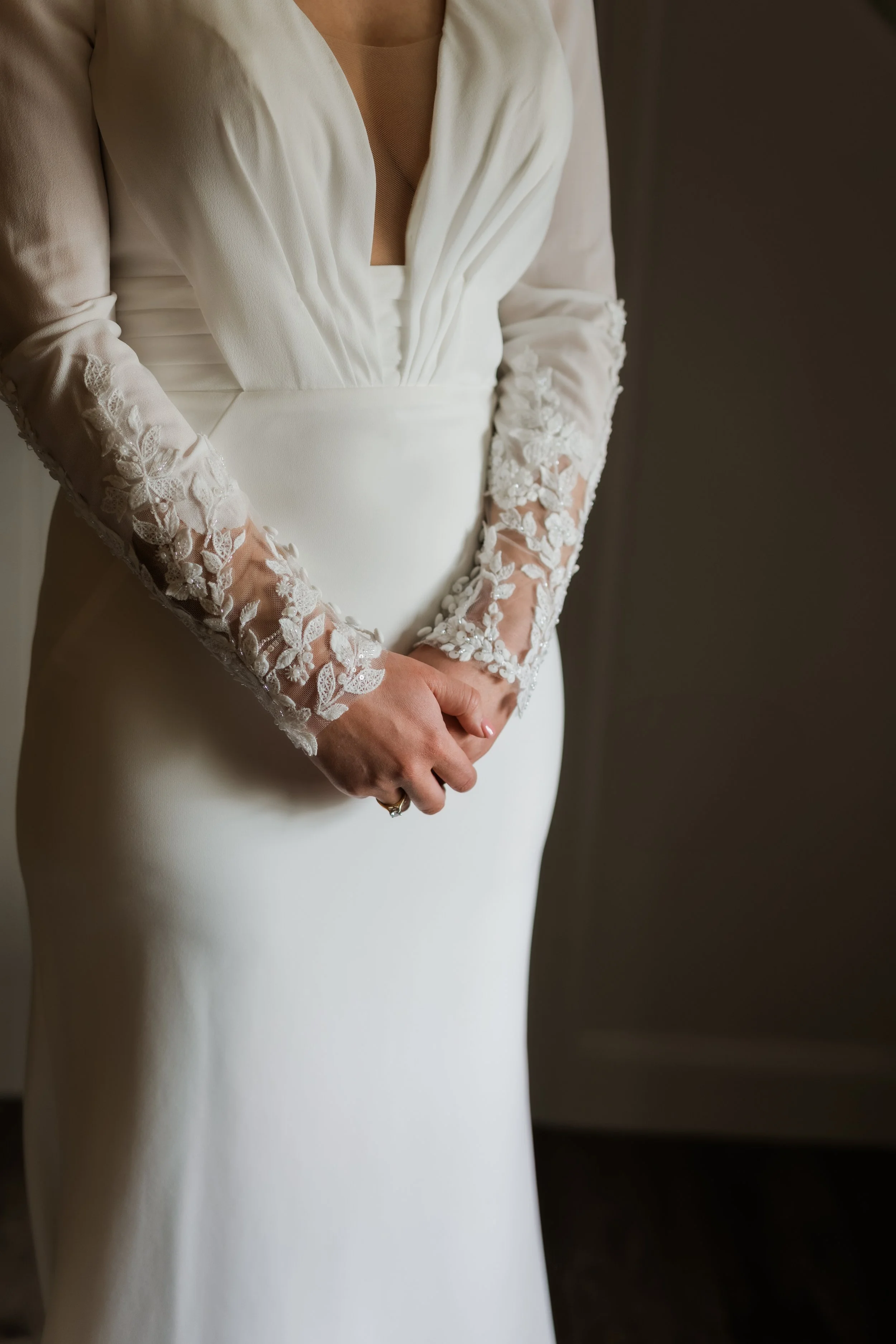 Candid bridal portrait in natural light at Charlton Hall, captured in a quiet moment before the ceremony