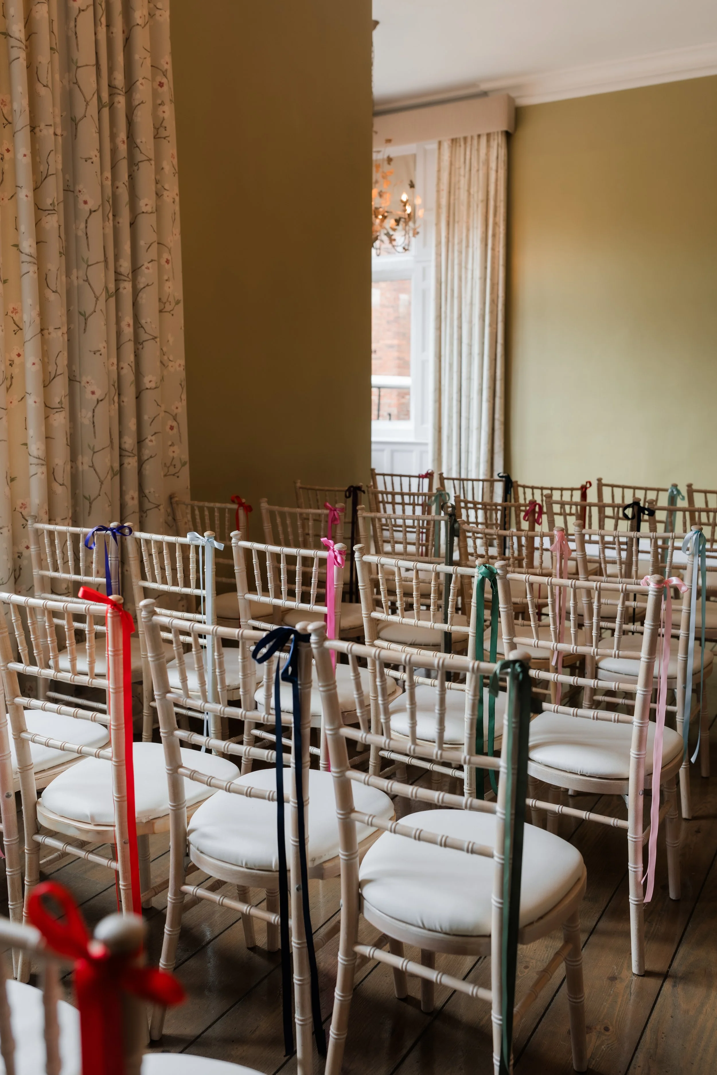 L&J Wedding Photography & Videography. Documentary Yorkshire Weddings.  Chair details with ribbons at Hodsock Priory