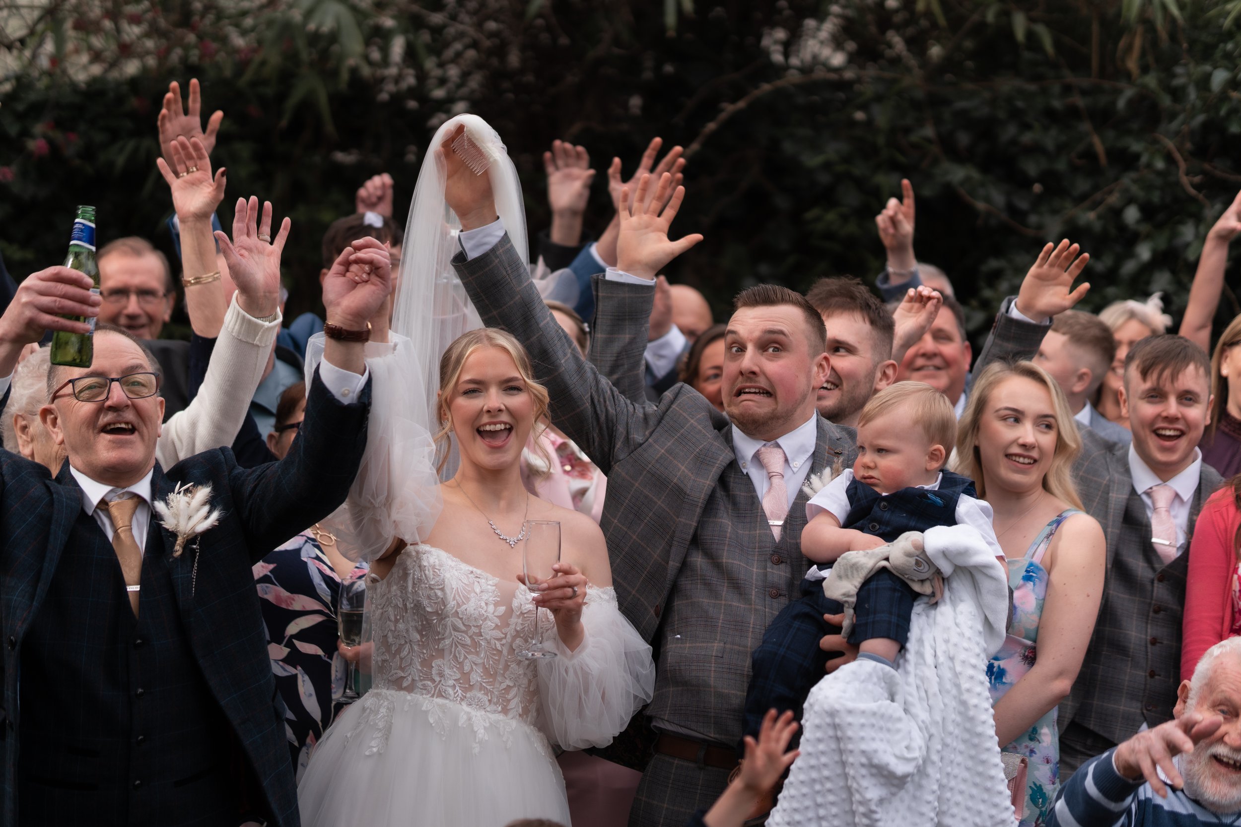 L&J Wedding Photography and Videography. Bride and groom. Groom removing veil accidentally. Yorkshire wedding. Fine art. Natural beautiful.