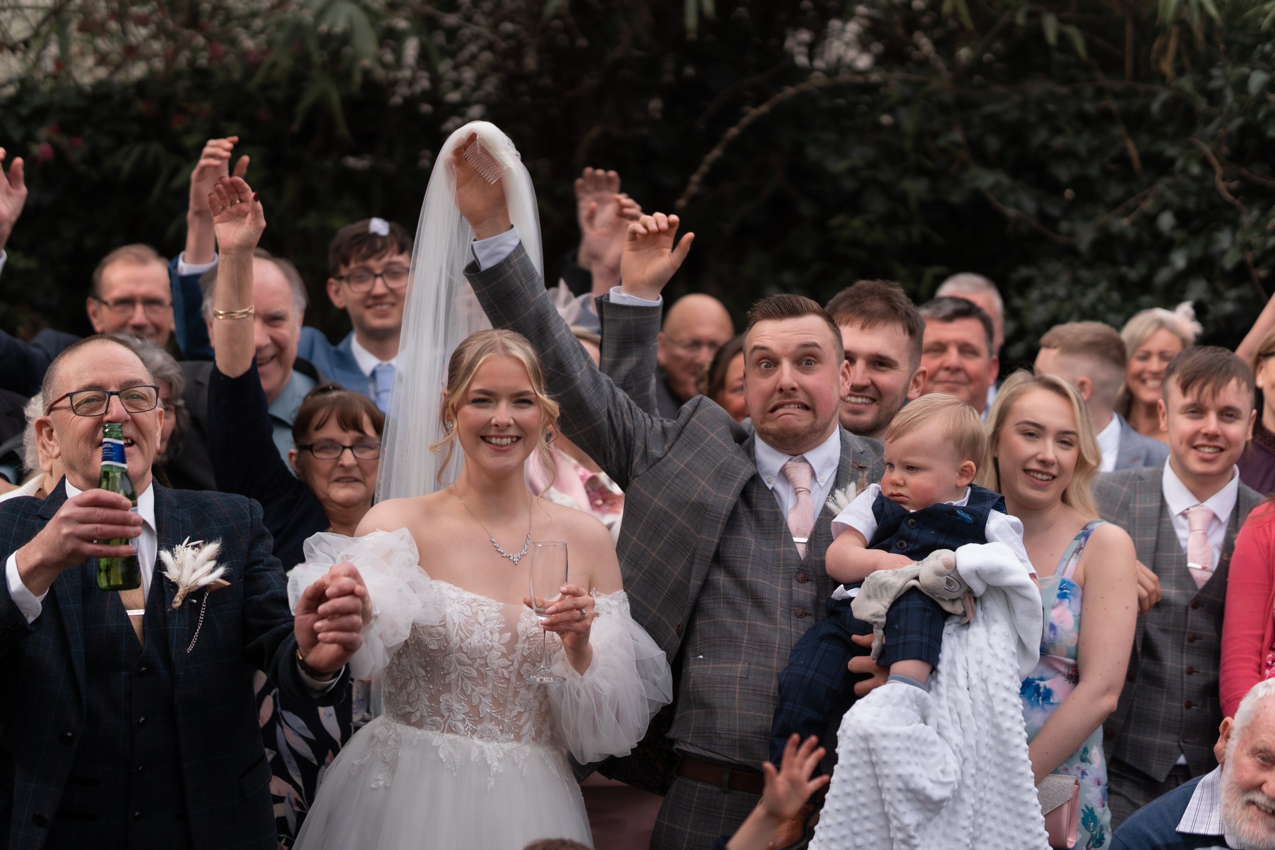 L&J Wedding Photography and Videography. Bride and groom. Groom removing veil accidentally. Yorkshire wedding. Fine art. Natural beautiful.